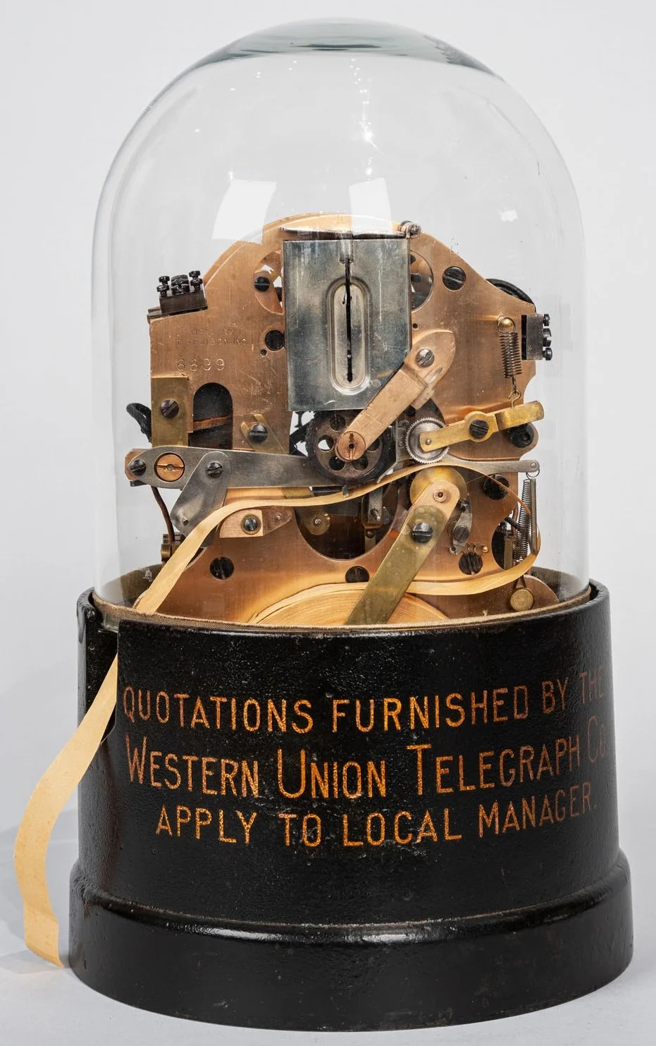 Western Union Telegraph Company self-winding stock ticker manufactured by T.A. Edison Inc. c.1905 original glass dome cast-iron base — Daniels Antiques
