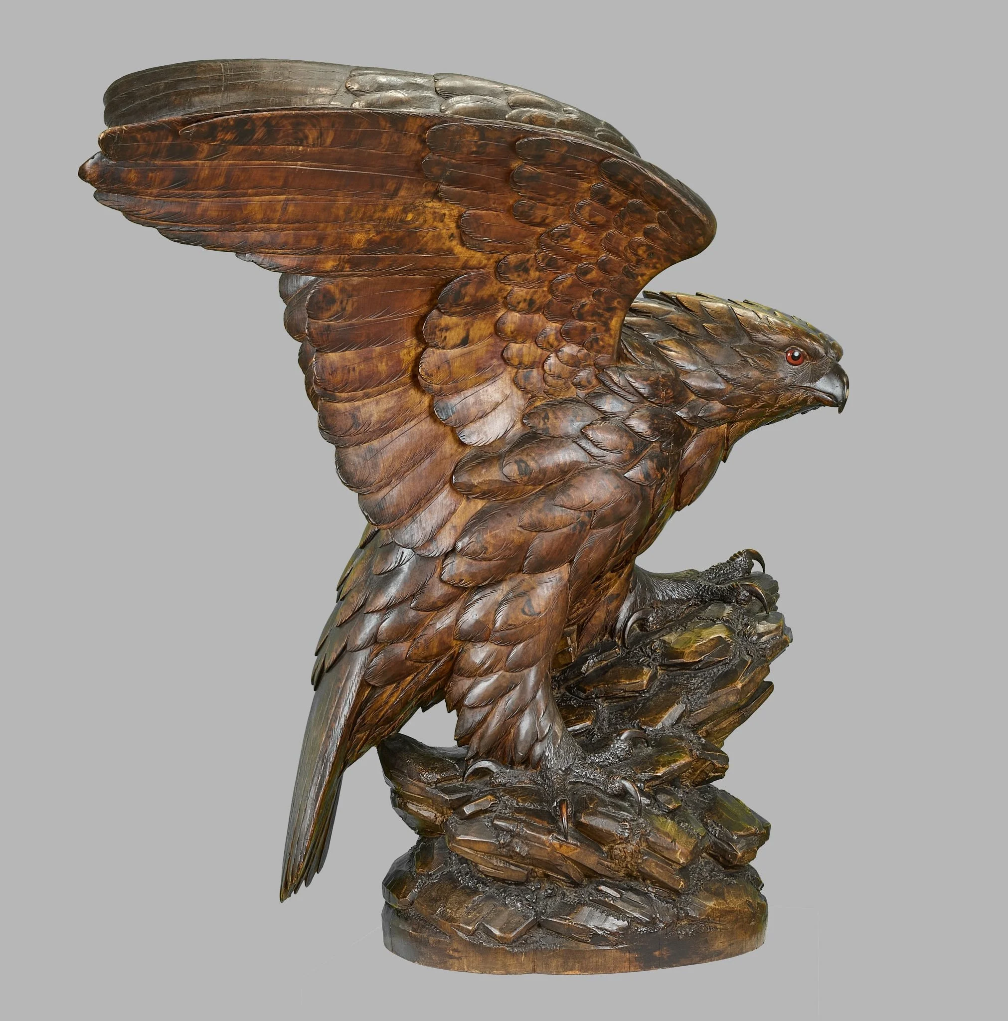 Black Forest carved golden eagle with scorched plumage and glass eyes, Brienz — Daniels Antiques