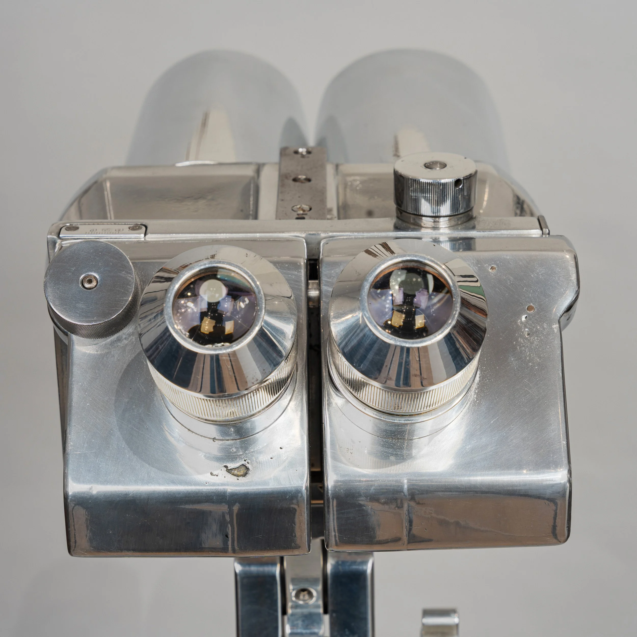 Ocular view of WWII German 10×80 anti-aircraft Flakfernrohr, polished aluminum, c.1944 — Daniels Antiques