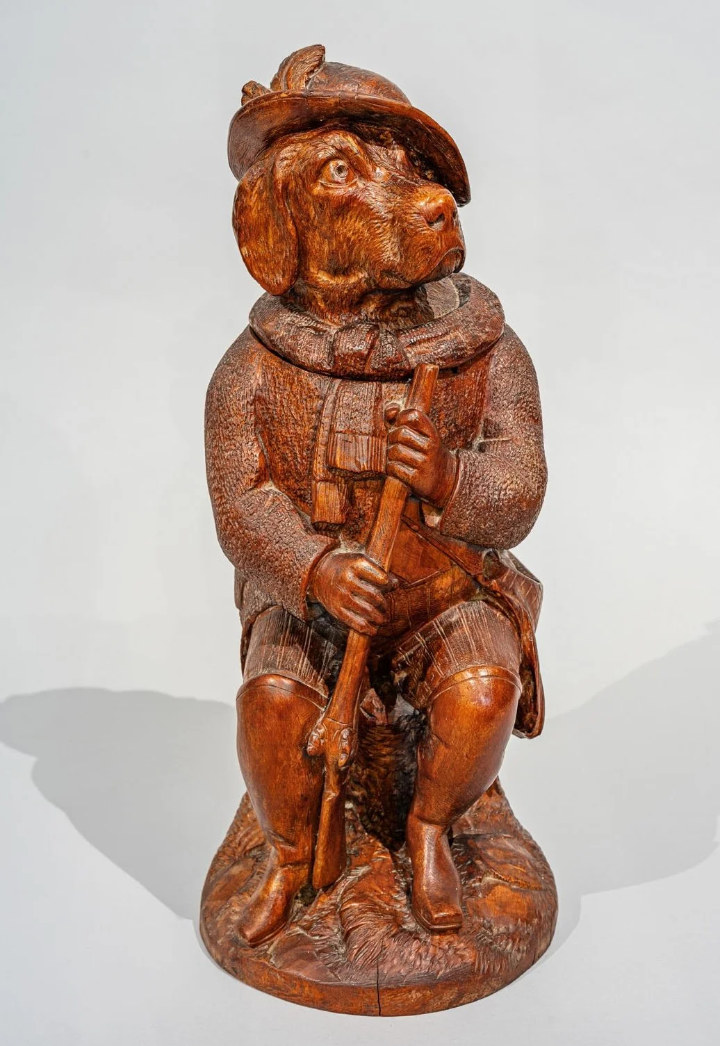 Swiss Black Forest hound hunter tobacco jar, carved walnut, Brienz 1870, full view