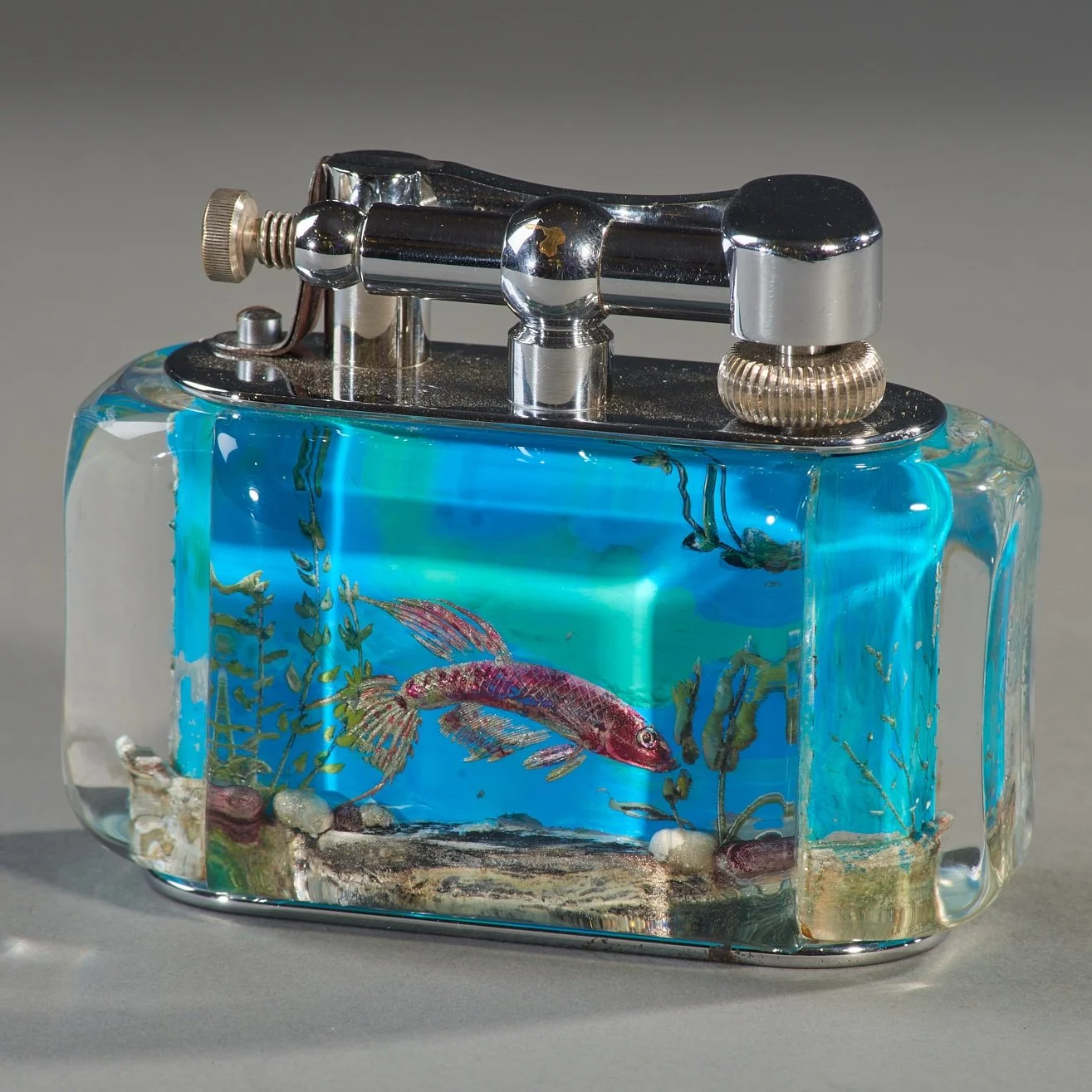 Hand-painted tropical fish detail inside Dunhill Aquarium lighter lucite body