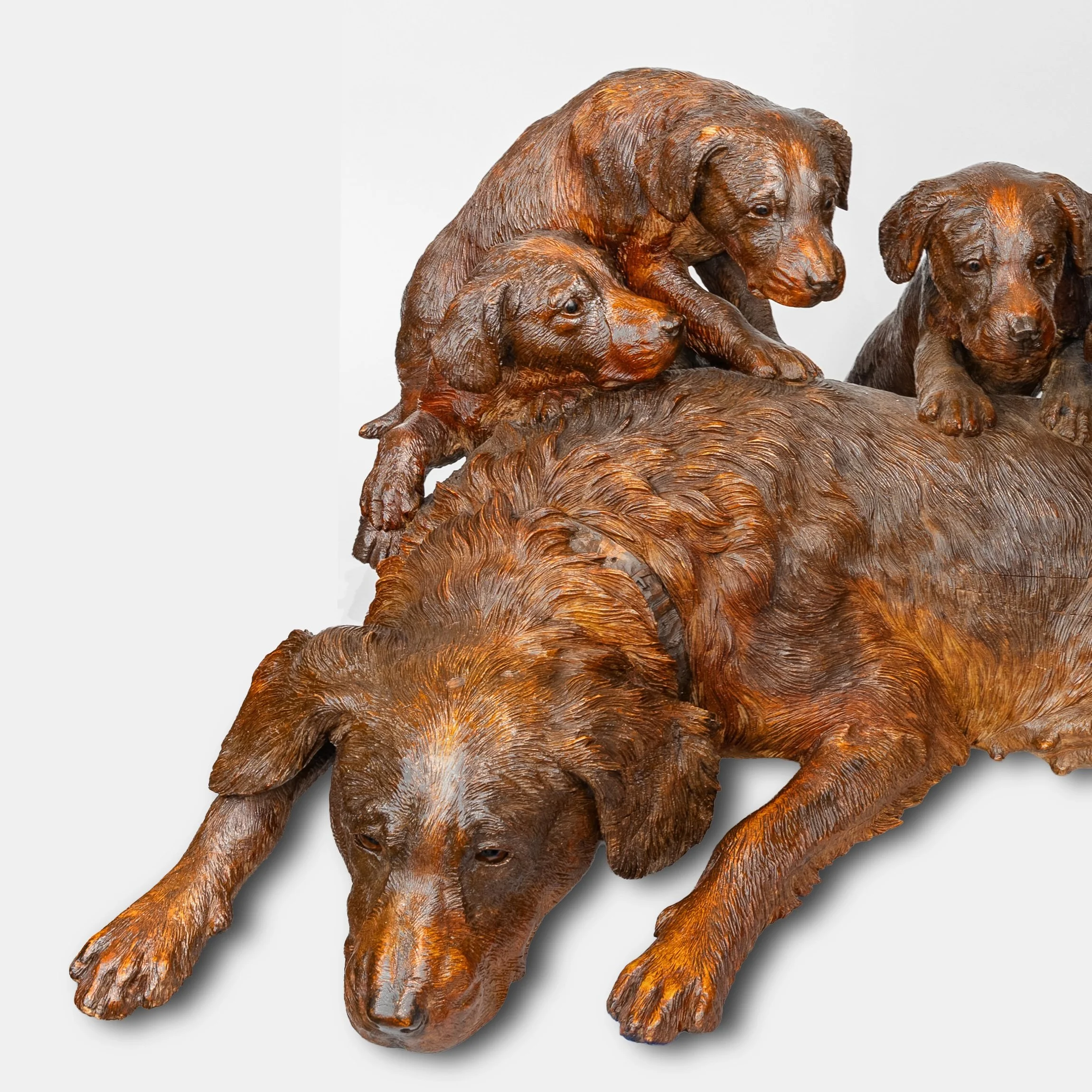 Swiss Black Forest Carved Mountain Maple Group of a Hound and Four Pups, Walter Mader, Brienz, circa 1870
