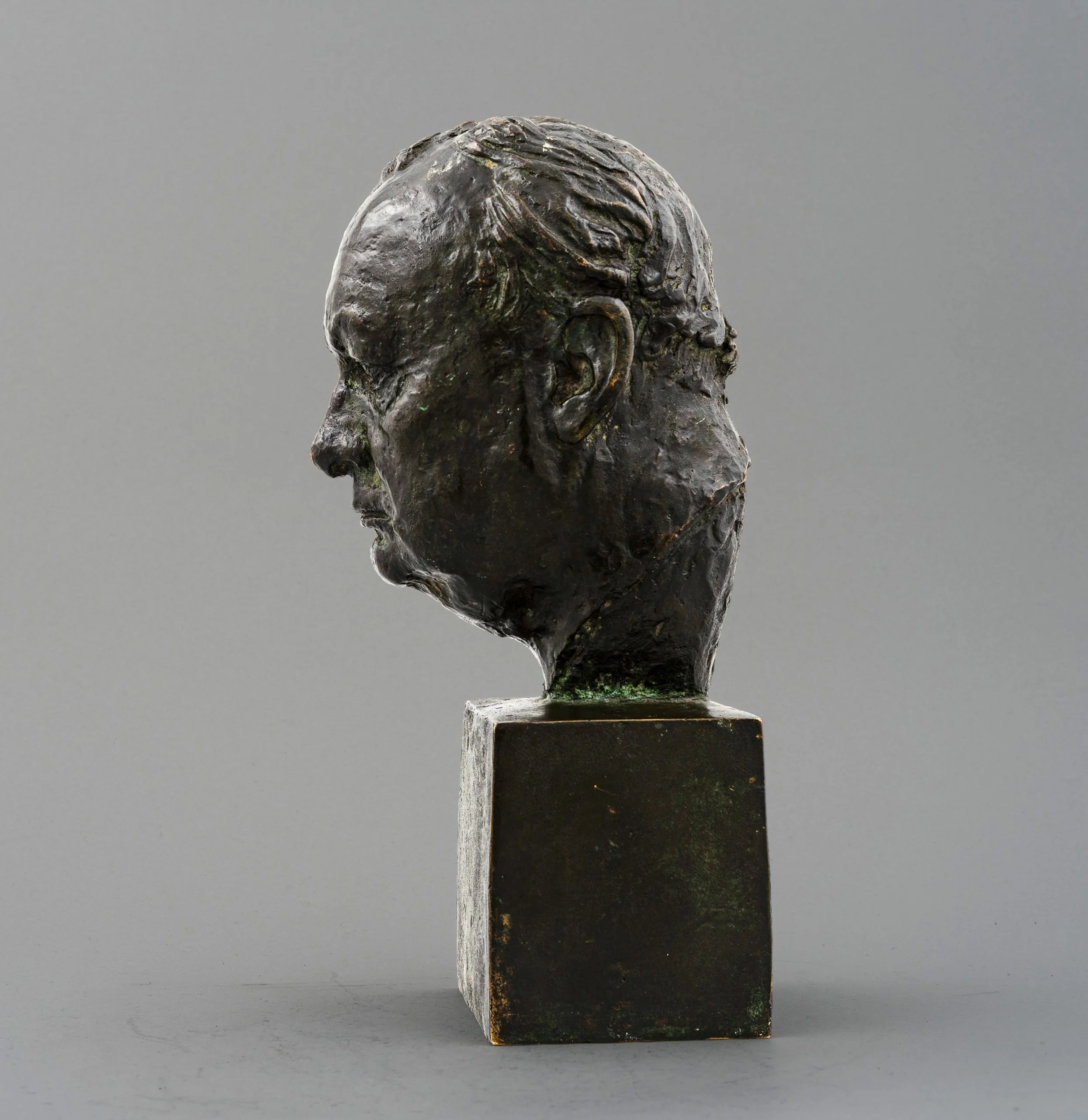Reid Dick bronze of Winston Churchill, left profile — Daniels Antiques.