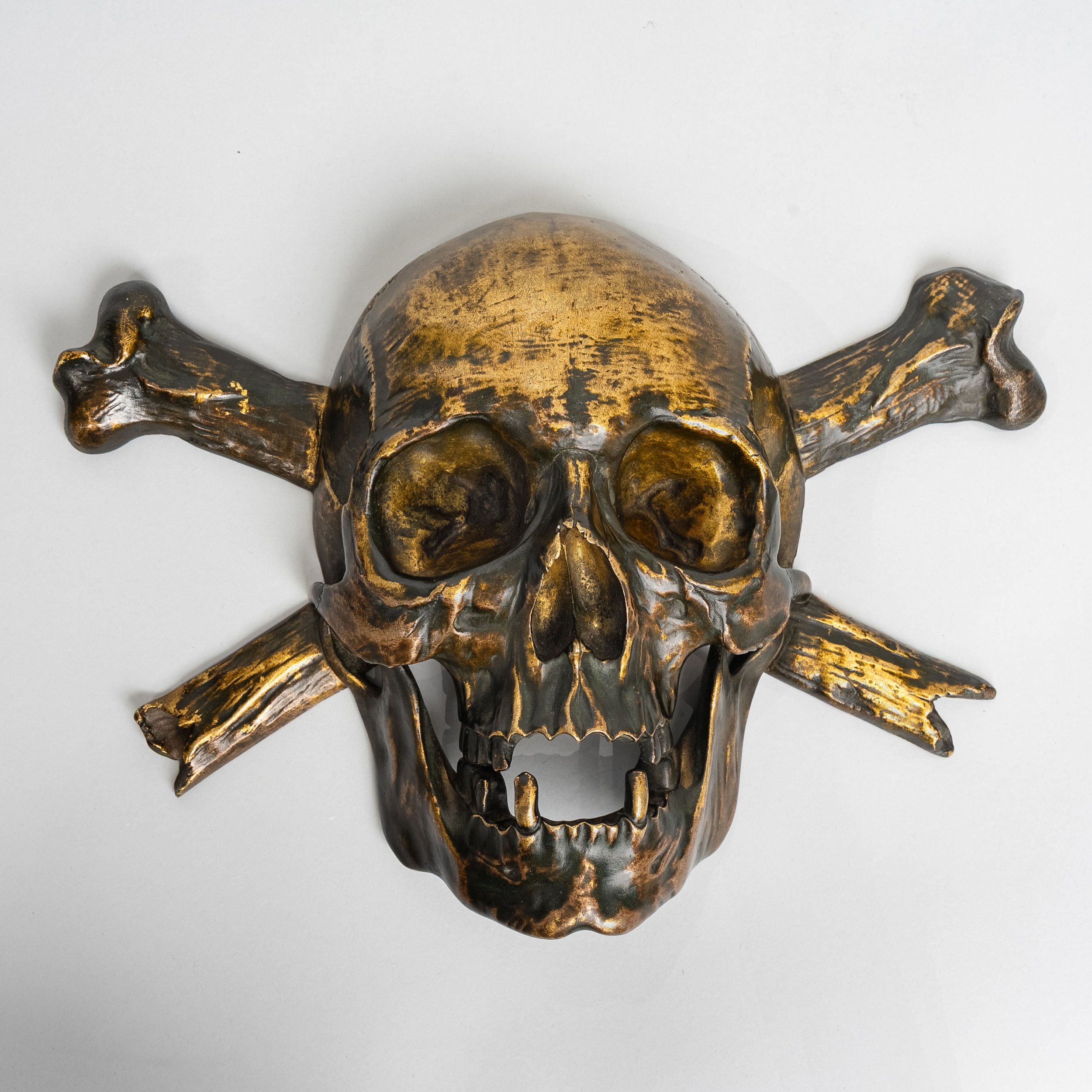 Life-size French gilt bronze memento mori skull with crossed broken bones, 19th century — Daniels Antiques