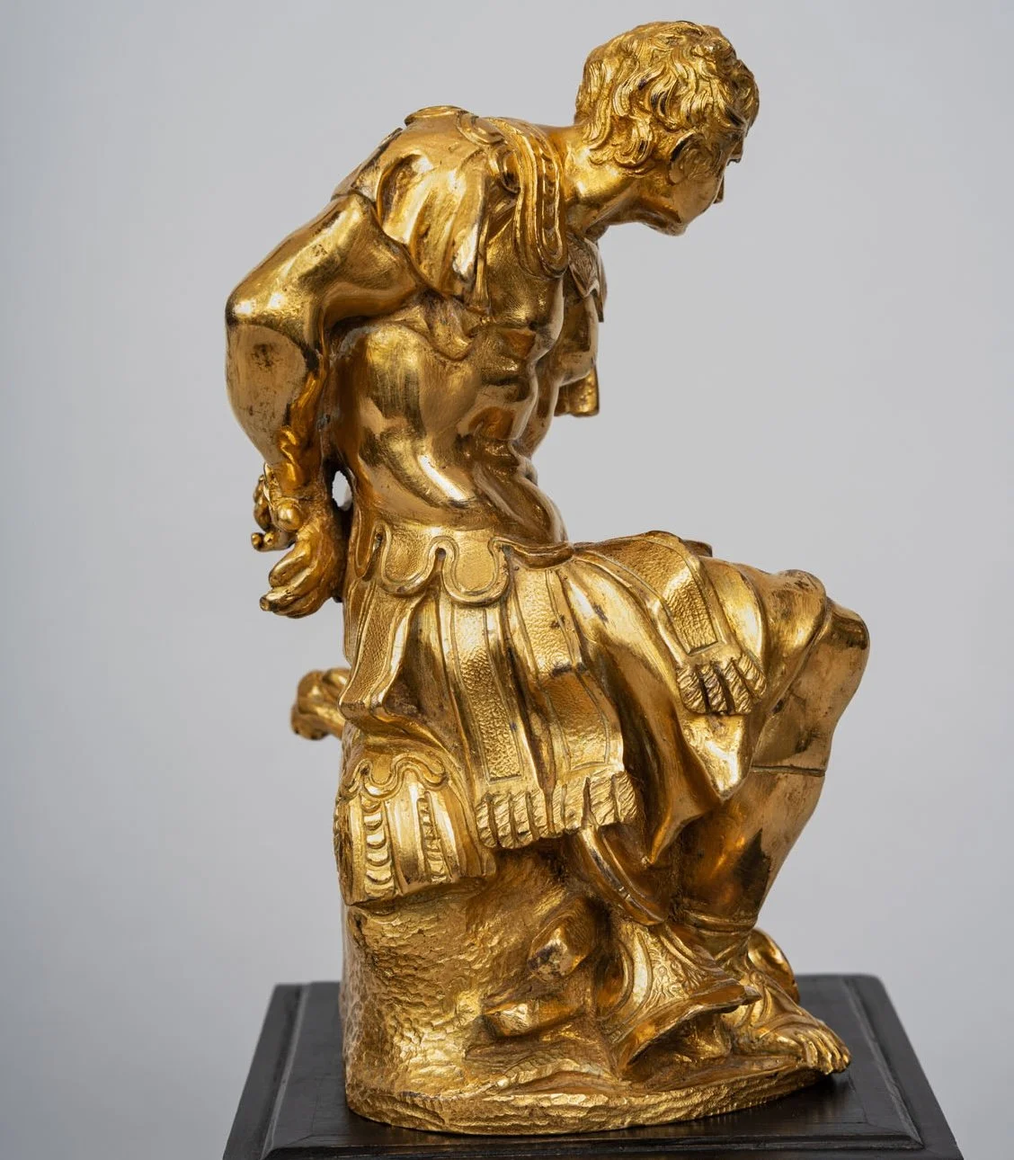Side of the gilt bronze Mars showing pteruges skirt and grounded arms — Daniels Antiques