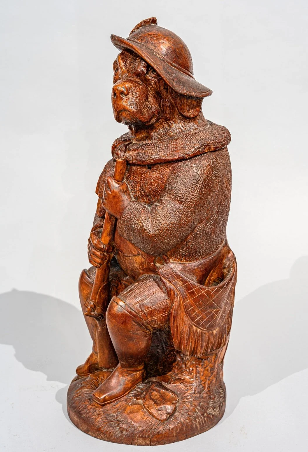Swiss Black Forest hound hunter tobacco jar, side view showing game bag, Brienz 1870