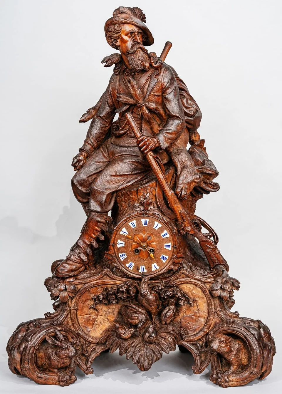 Carved walnut Black Forest hunter clock signed J. Huggler, Brienz, 19th century — Daniels Antiques