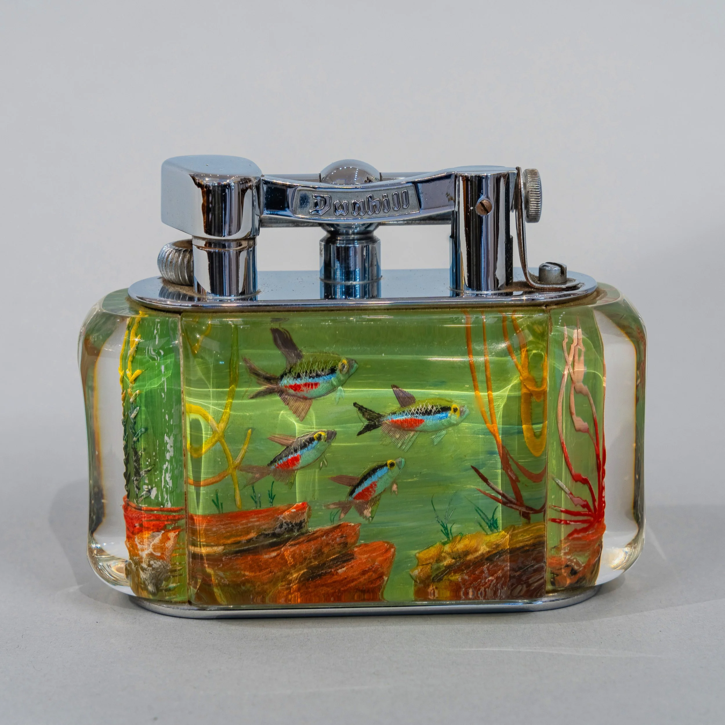 Dunhill Aquarium Table Lighter — Hand-Carved & Painted Lucite, circa 1950–1959.