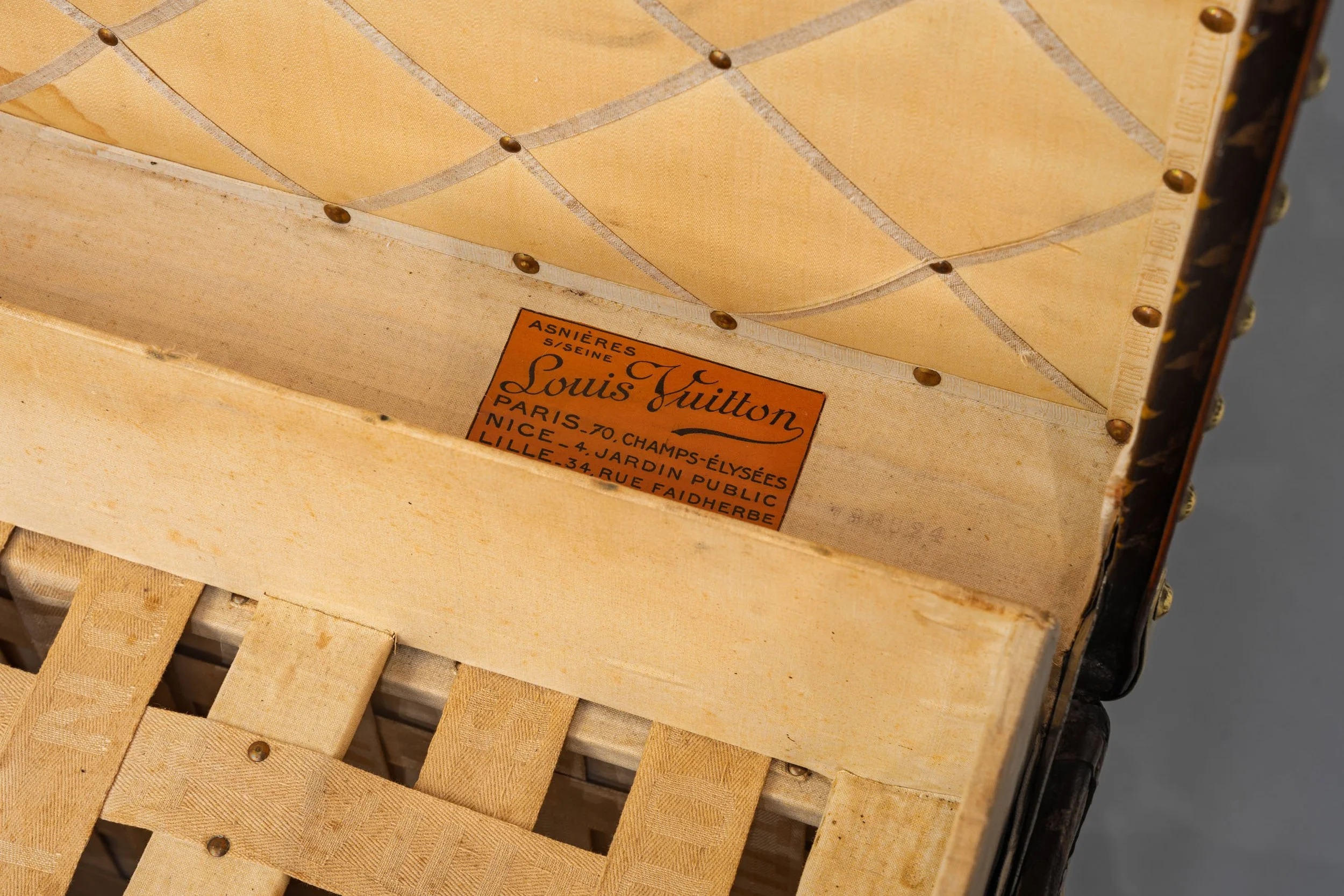Louis Vuitton trunk interior label showing Asnières workshop, Paris 70 Champs-Élysées, Nice and Lille retail addresses, post-1914 — Daniels Antiques
