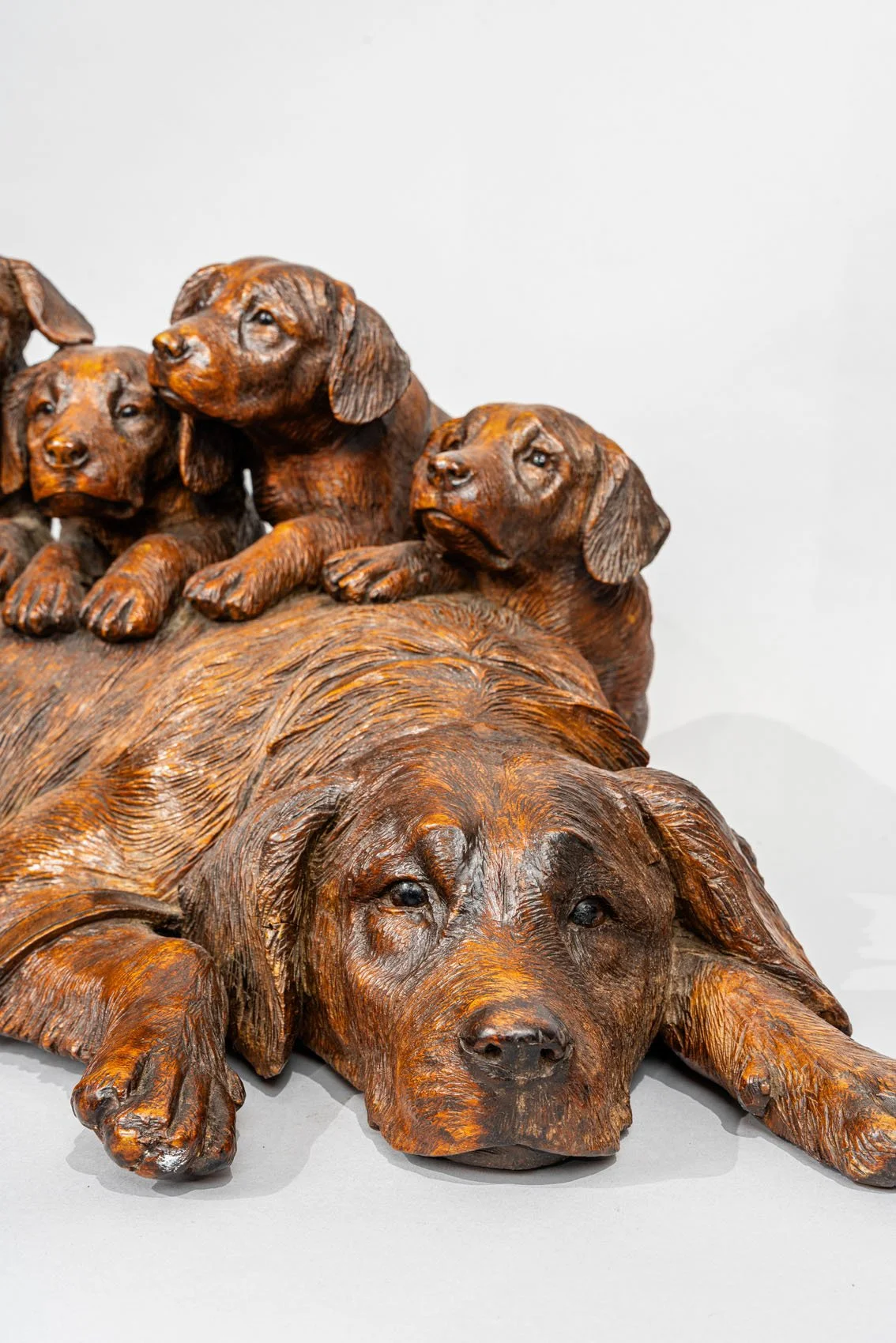 BLACK FOREST CARVED DOG GROUP, CIRCA 1870.