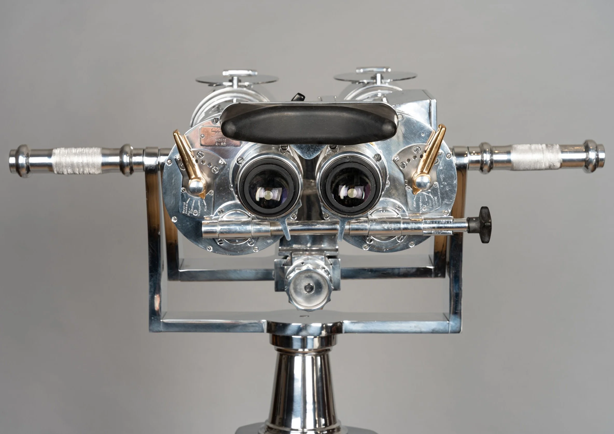 Carl Zeiss DF 8×60 naval binoculars, front view showing eyepiece lenses and brass filter levers