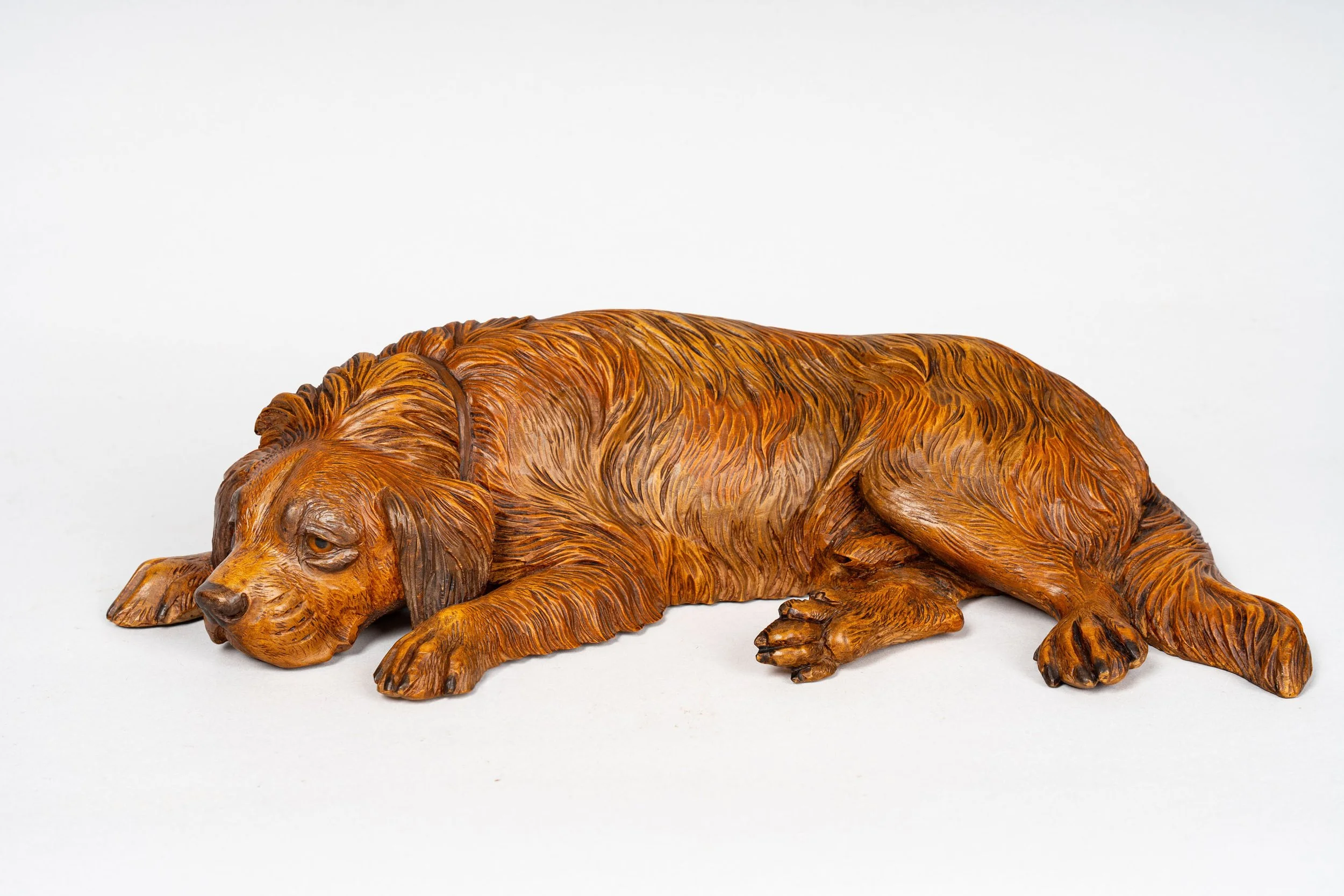 Portrait of Nase, carved walnut recumbent hound, Johann Huggler, Brienz 1873