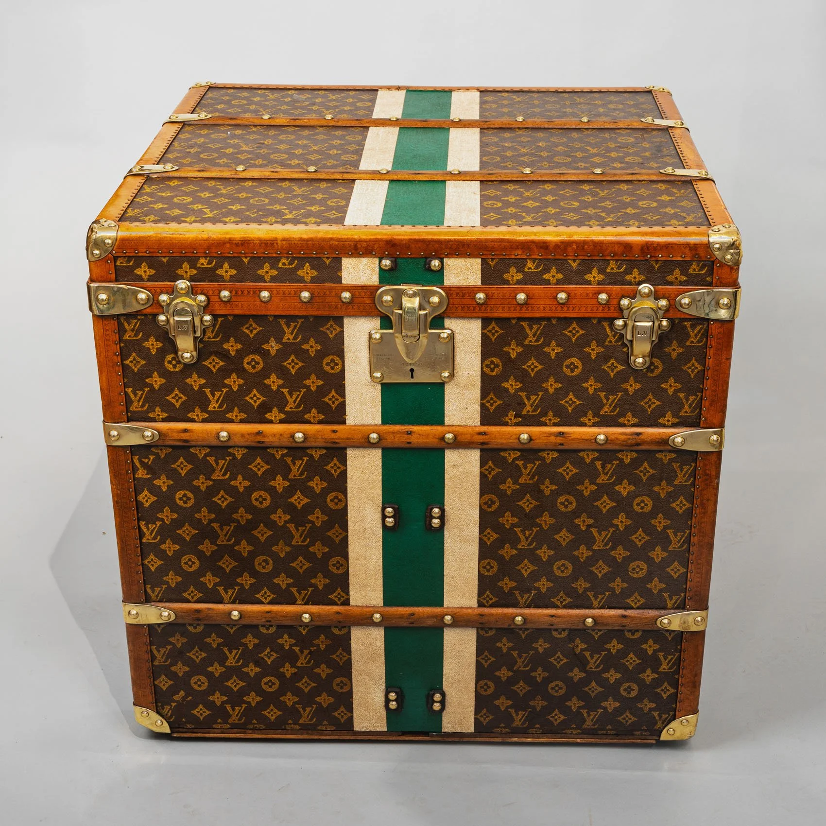 Antique Louis Vuitton monogram courier trunk with green and white painted stripe and brass fittings — Daniels Antiques