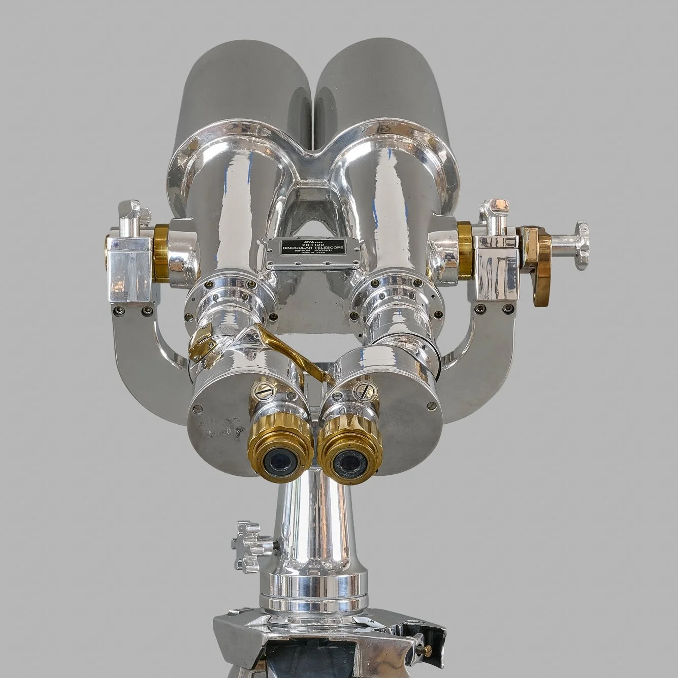 Nikon Nippon Kogaku 20×120 naval binoculars, front view showing objectives and original nameplate — Daniels Antiques