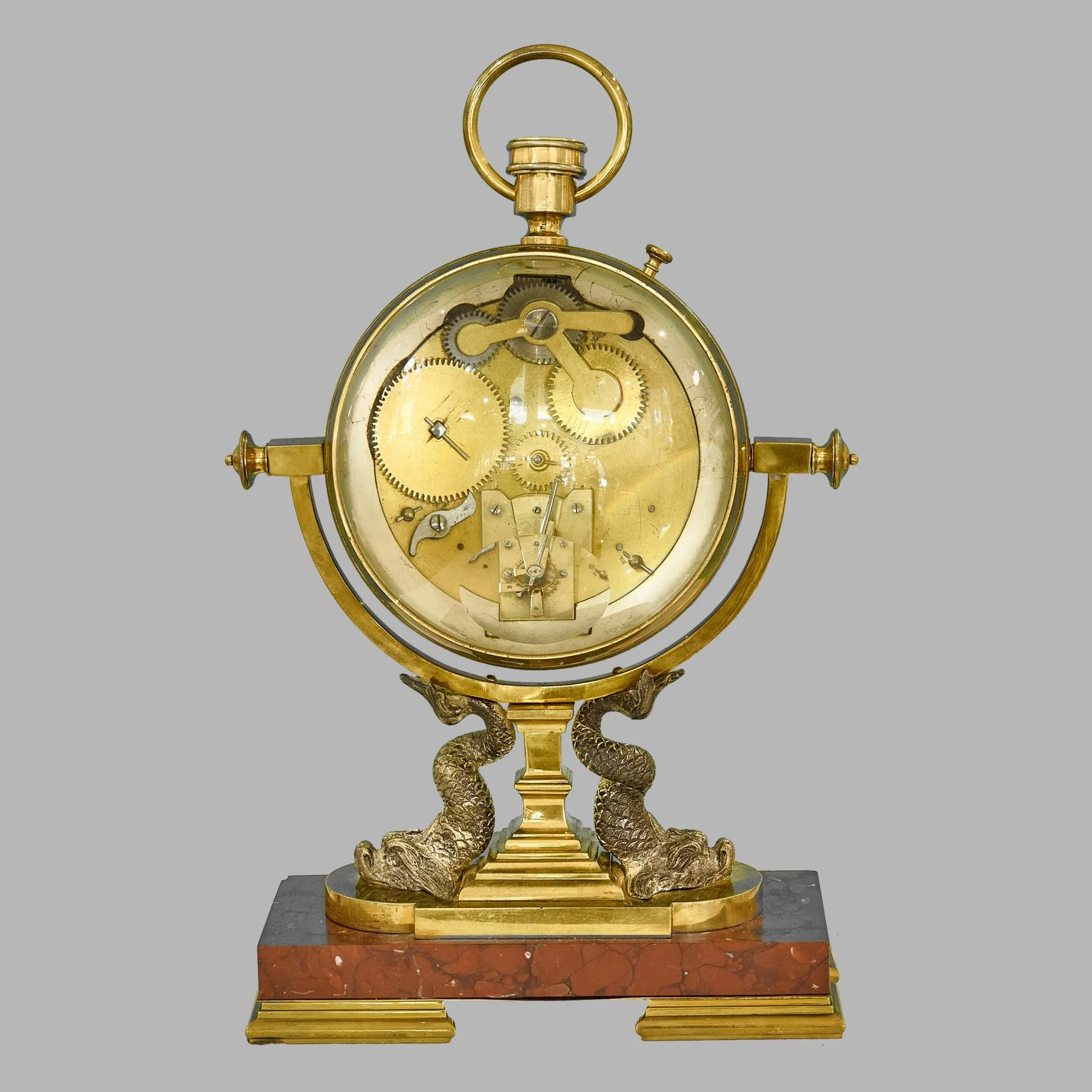 Rear of ball clock showing gilt movement through bevelled glass — Daniels Antiques