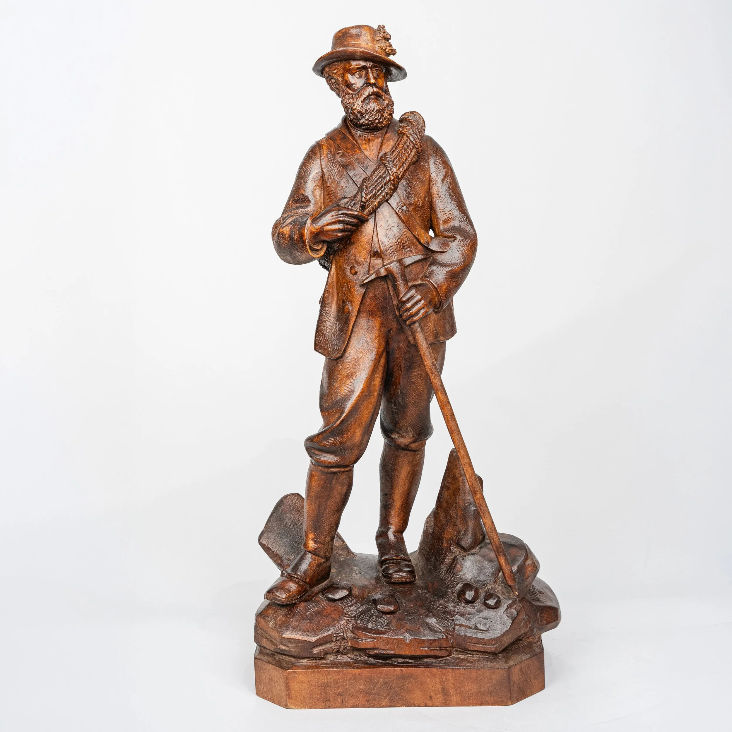 Swiss Black Forest Carved Walnut Figure of an Alpine Hunter, Johann Huggler, Brienz, circa 1870