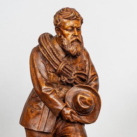 Standing Johann Huggler with rope and hat, Alpine memorial group, Brienz 1873