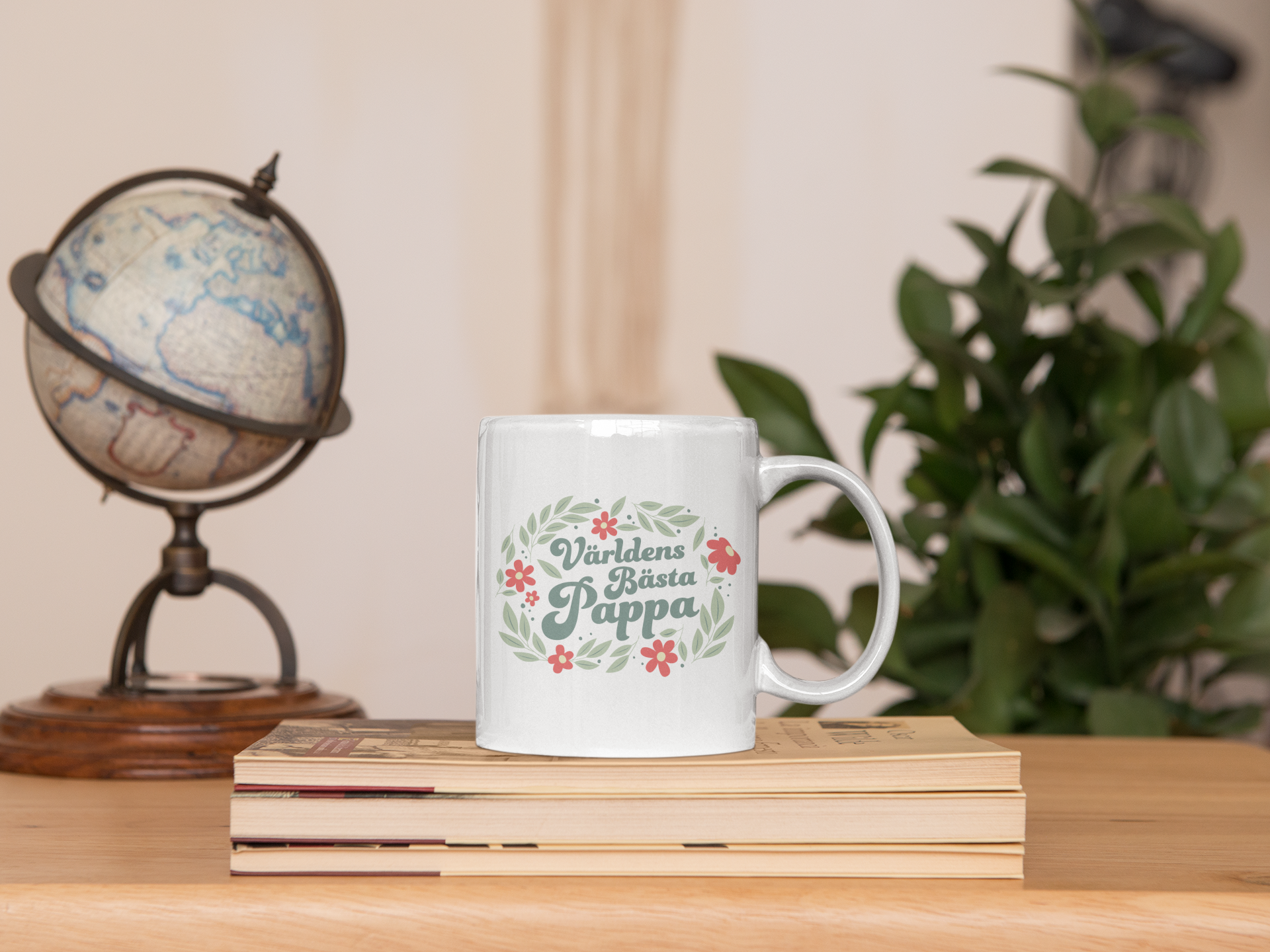 sticker-mockup-featuring-an-11-oz-mug-on-a-set-of-books-33615.png
