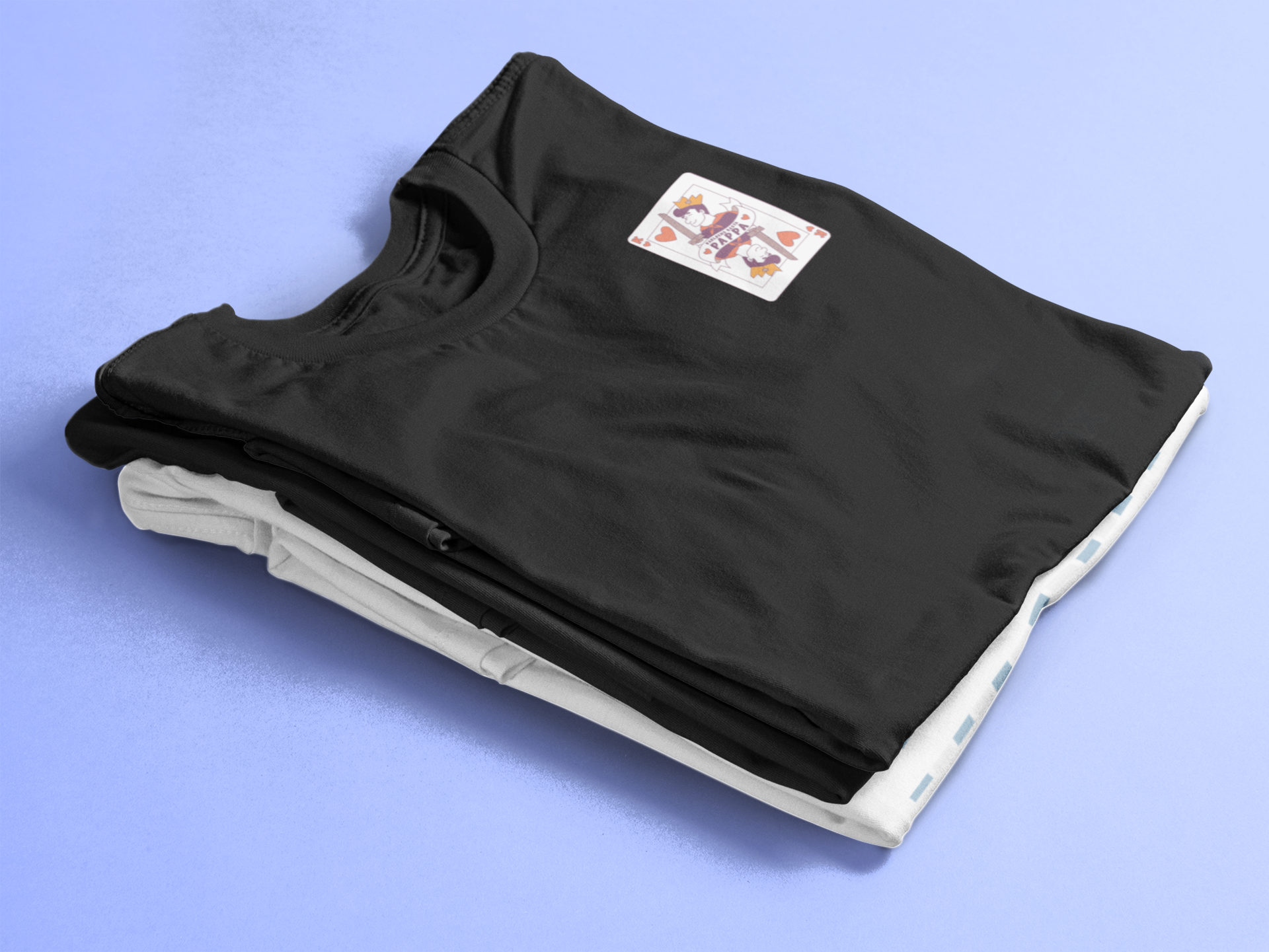 folded-t-shirts-mockup-over-a-flat-backdrop-6492a.png