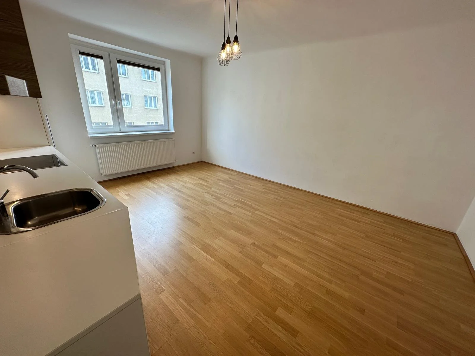 Wohnzimmer mit Wohnküche