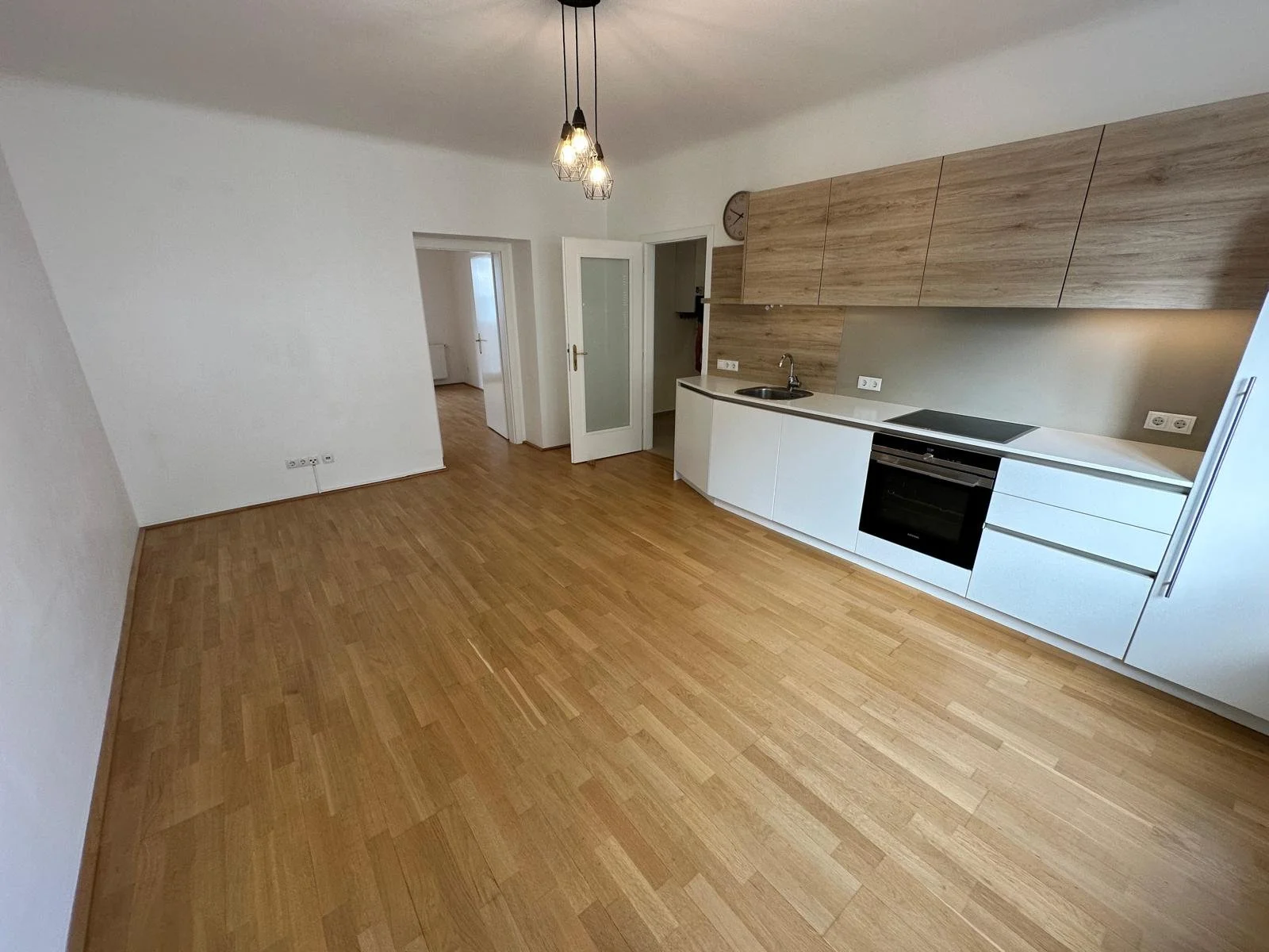 Wohnzimmer mit Wohnküche