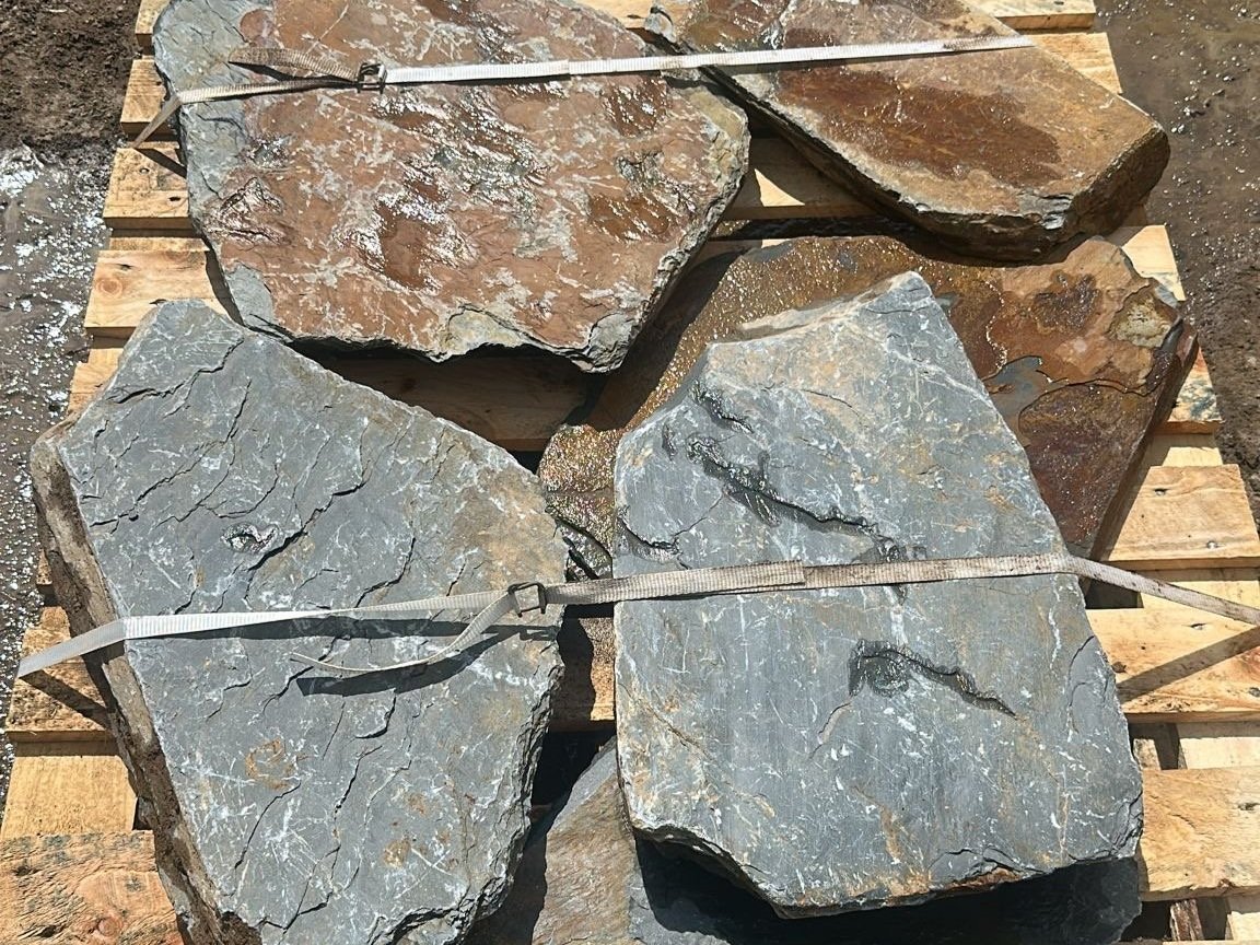 grey slate stepping stones for garden on pallet