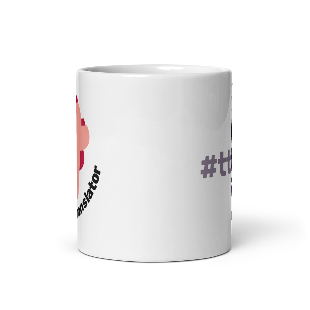 Side of the white glossy mug showing a bit of the #TeamTranslator logo and the words.