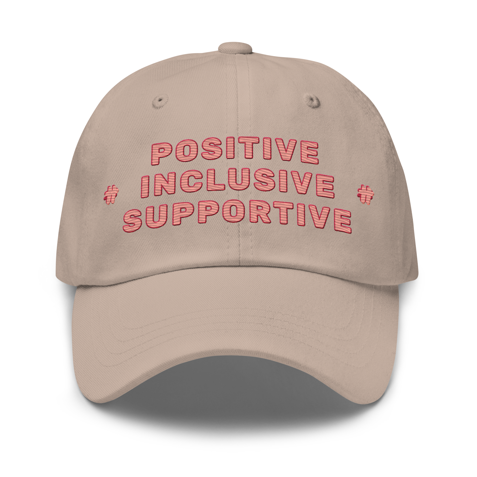 Front of the stone-coloured adjective dad hat with the text embroidered in pink that reads: positive, inclusive, supportive. There are two tiny #TeamTranslator logos on two sides of the text.