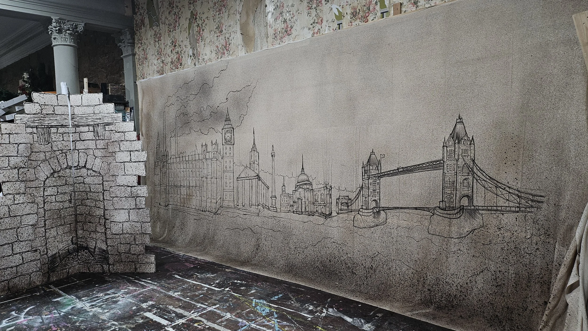 Hand inked London ‘skyline’ on cotton dust sheet with umber spatter vignette ‘smoke’