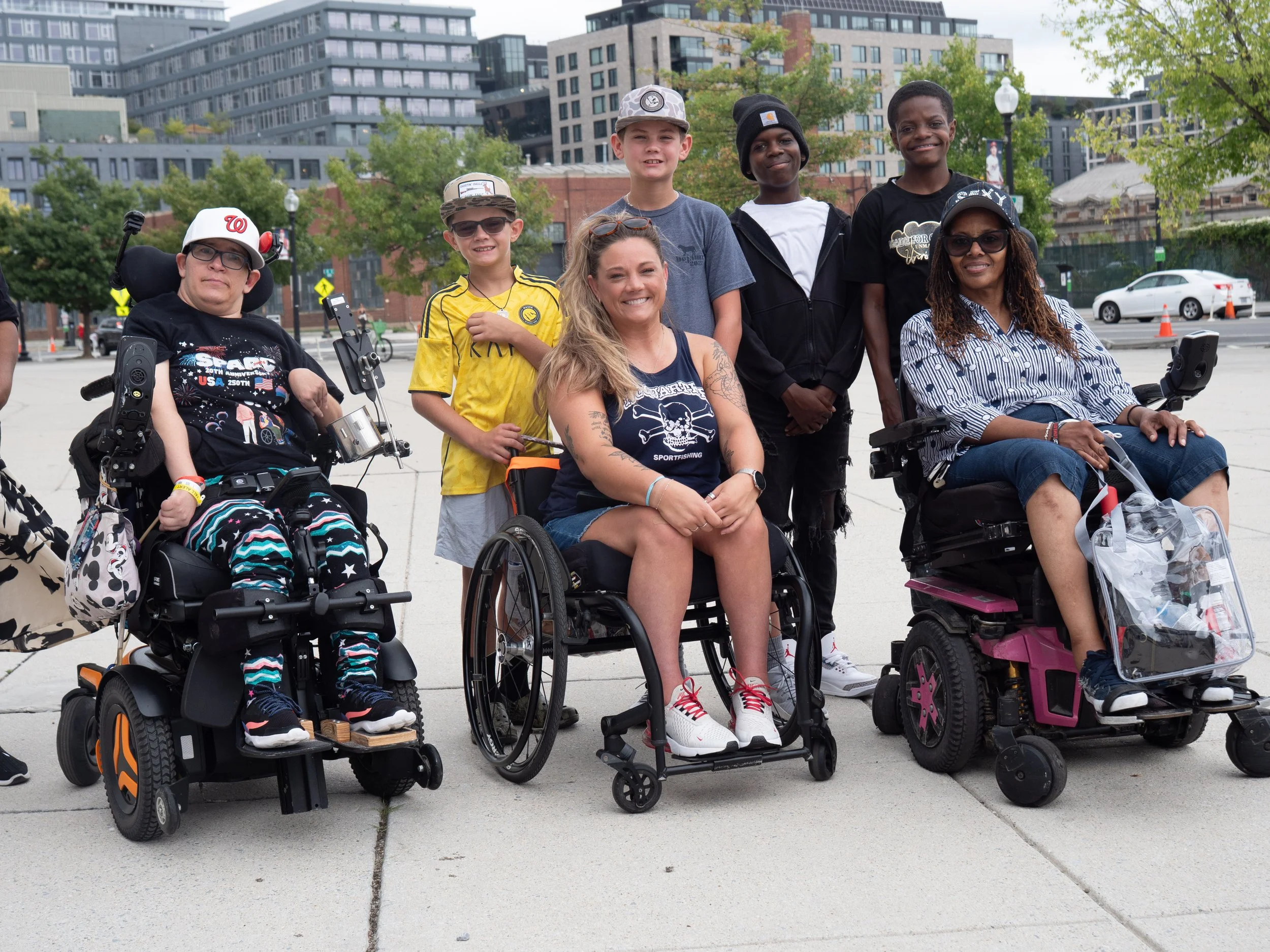 Disability Partnerships team members and supporters pose together during Play Without Limits