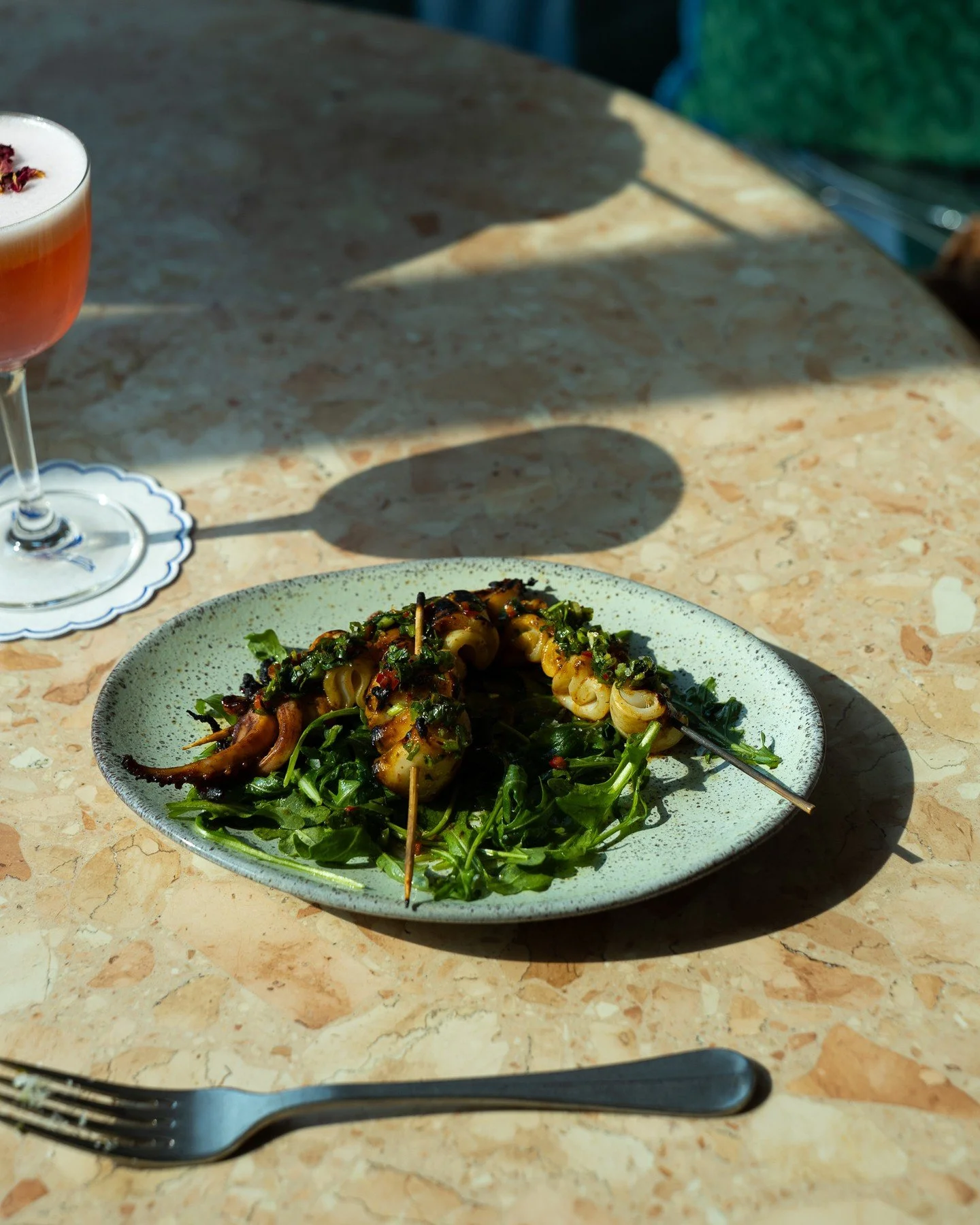 Our Grilled Calamari with pomegranate, dill, and chili. Simple and delicious.⁠
⁠
Love,⁠
D.D. 🛵