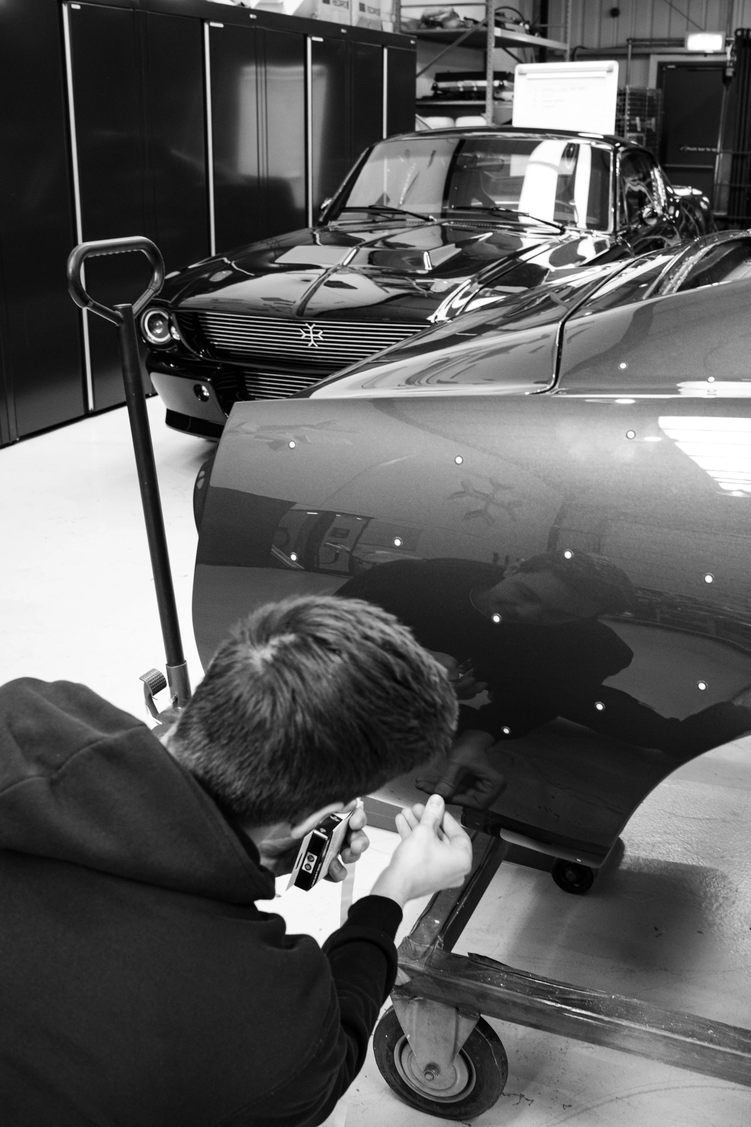 To 3D scan the bodyshells, reflective stickers are randomly placed all over.