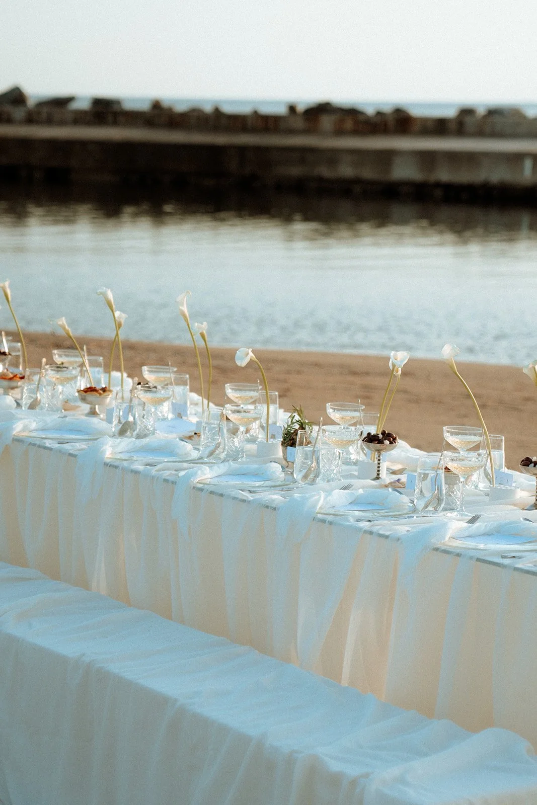mediterranean cala lily inspired styled shoot wedding next to the sea