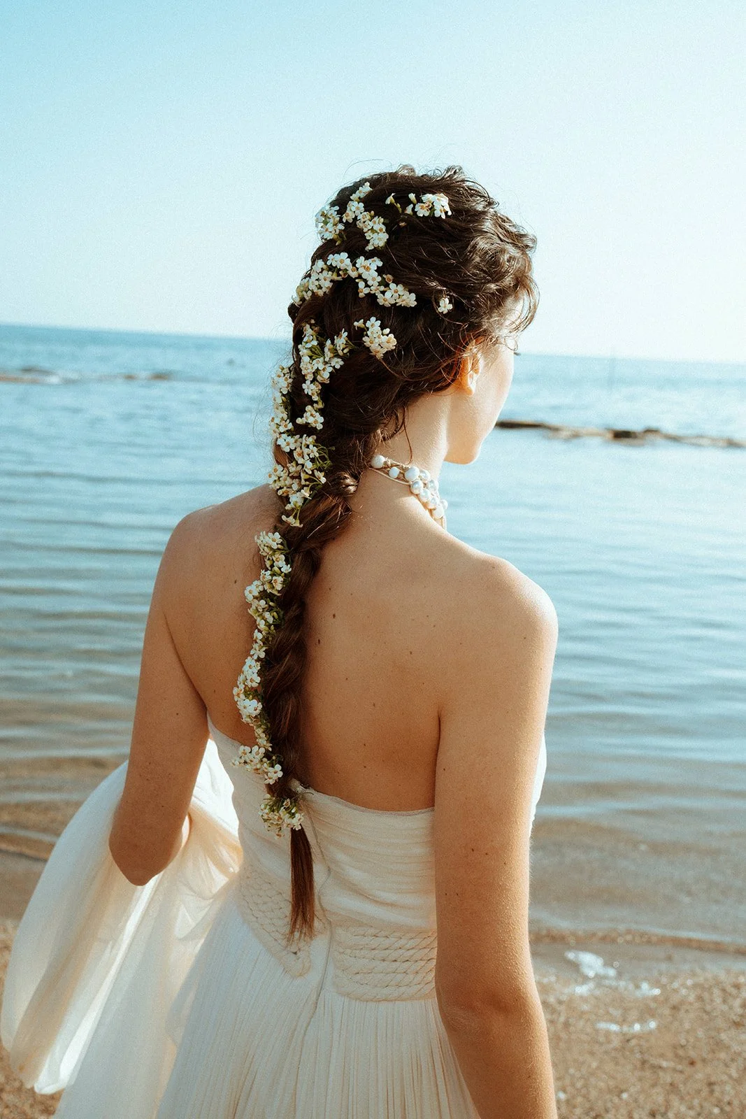 small flowers in braids hair, bridal hair, greek model