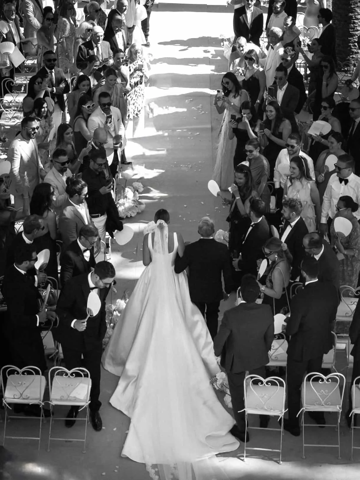 Bride and father entering ceremony black and white 