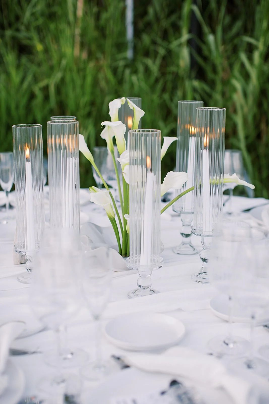 white candles and white wedding decor 