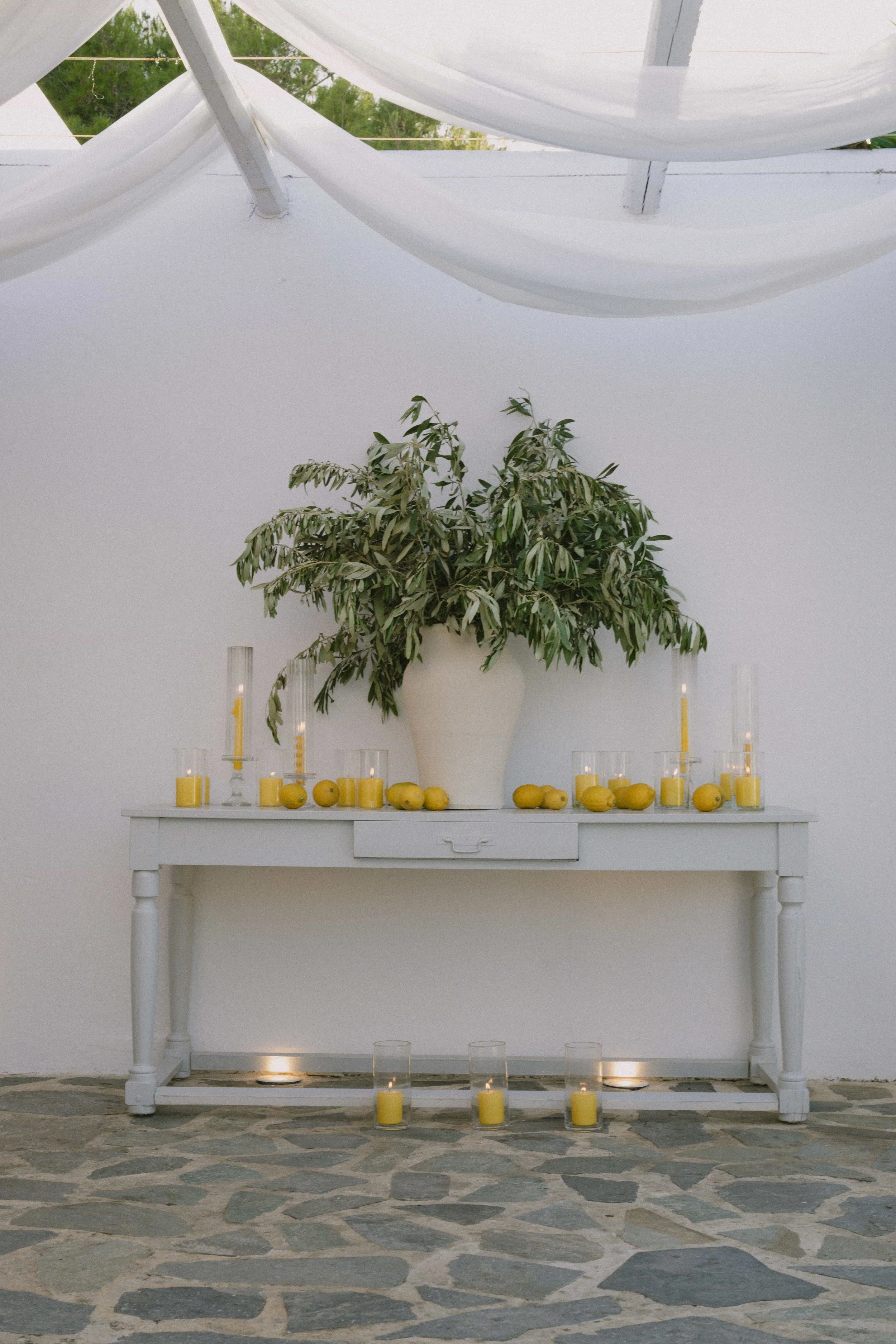 lemon and olives and white drapes
