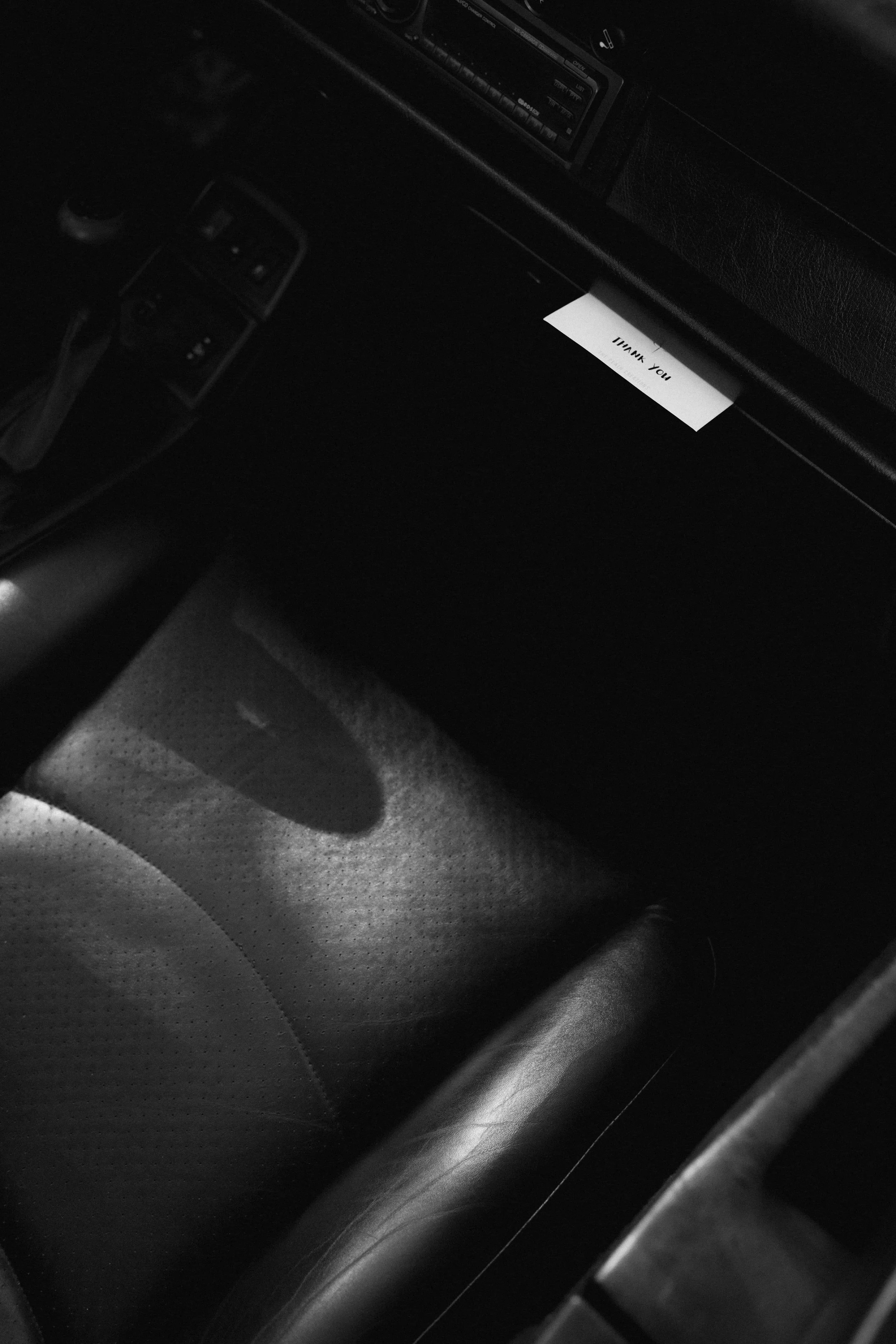 note in a porsche 