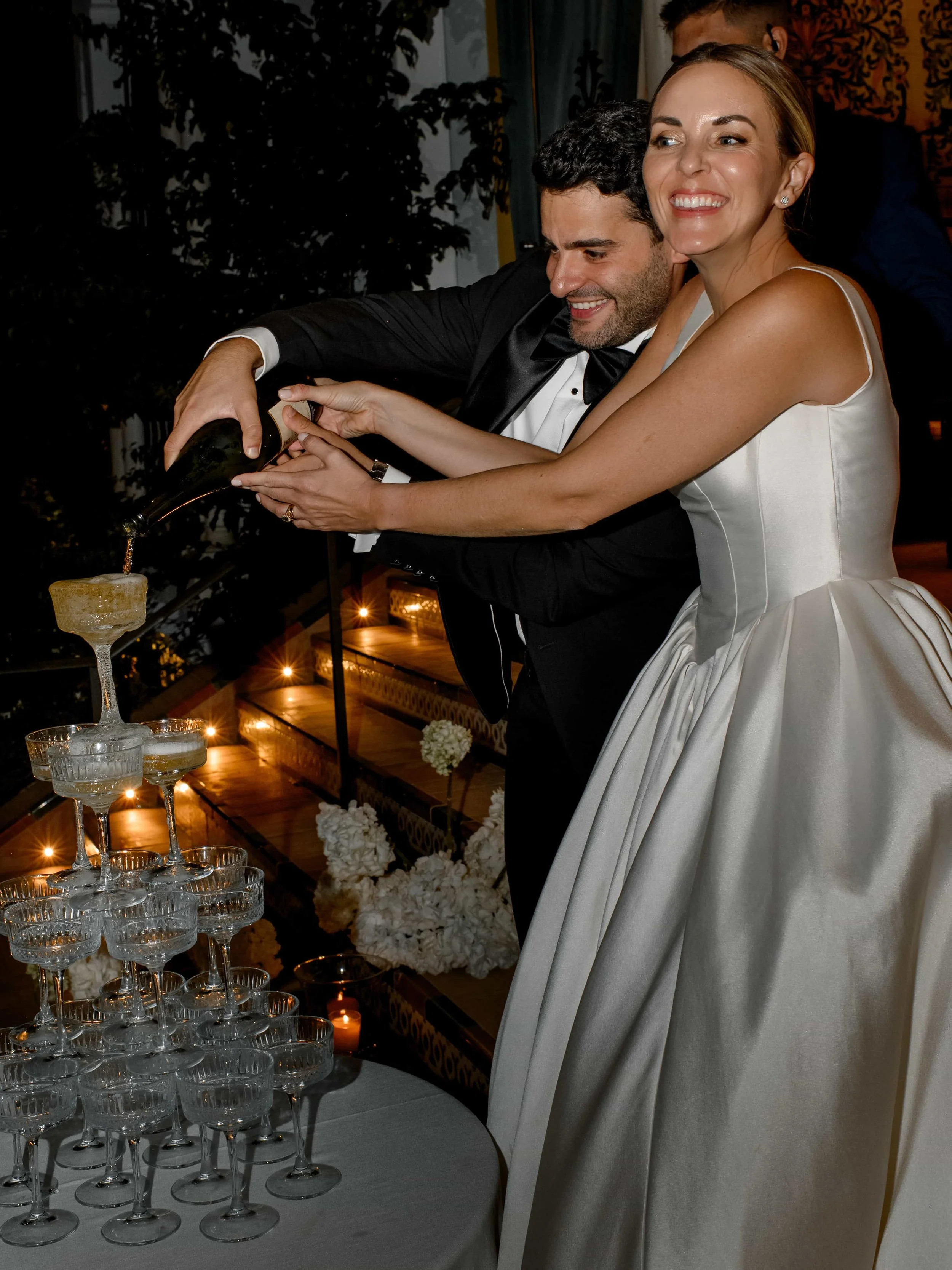 couple and champagne tower 