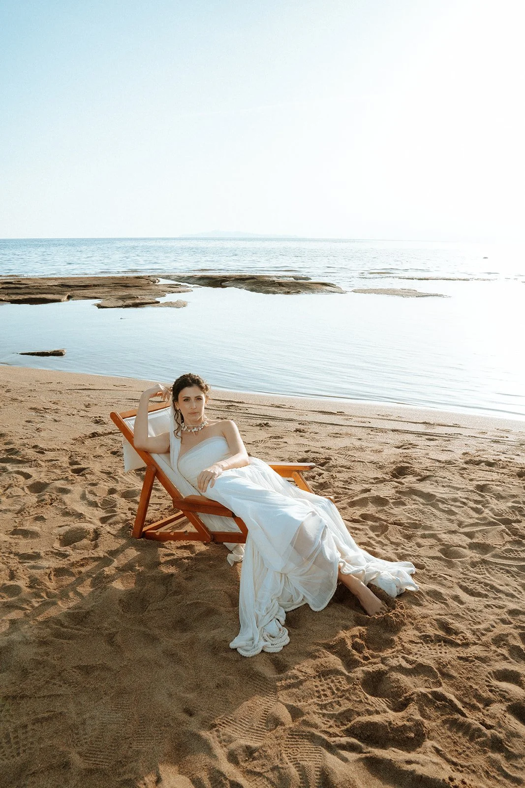 Greek model posing on a wild greek beach