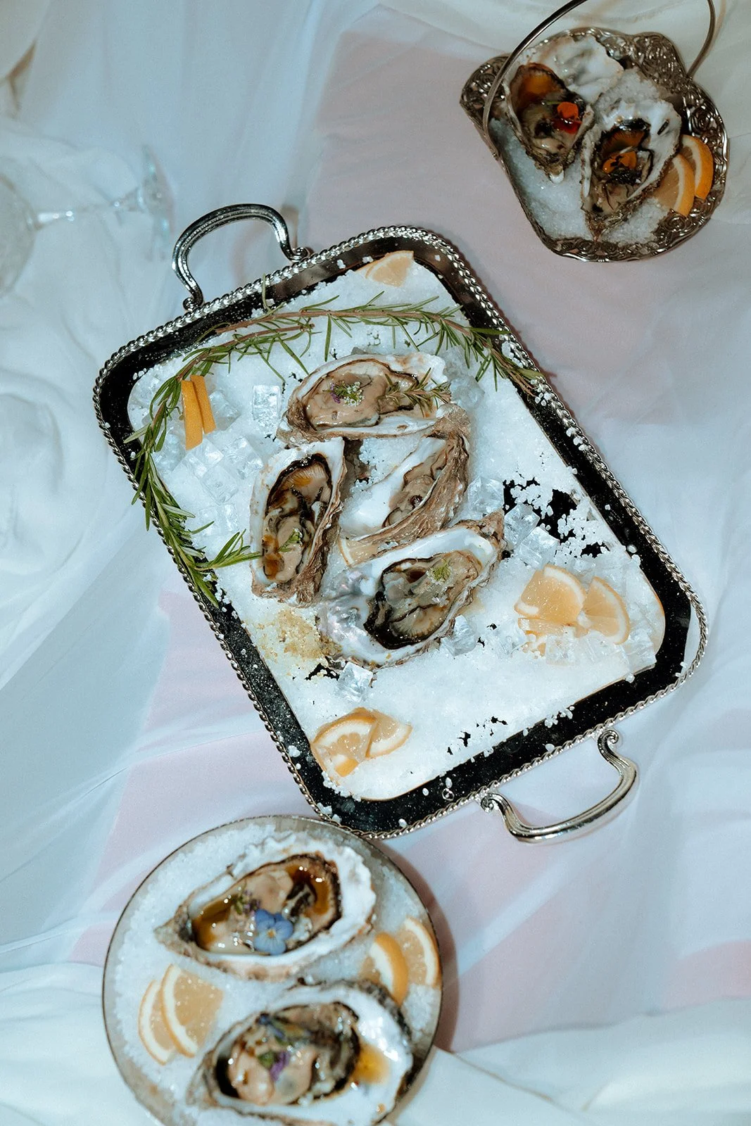 clams and mussels in silver trays wedding decor 