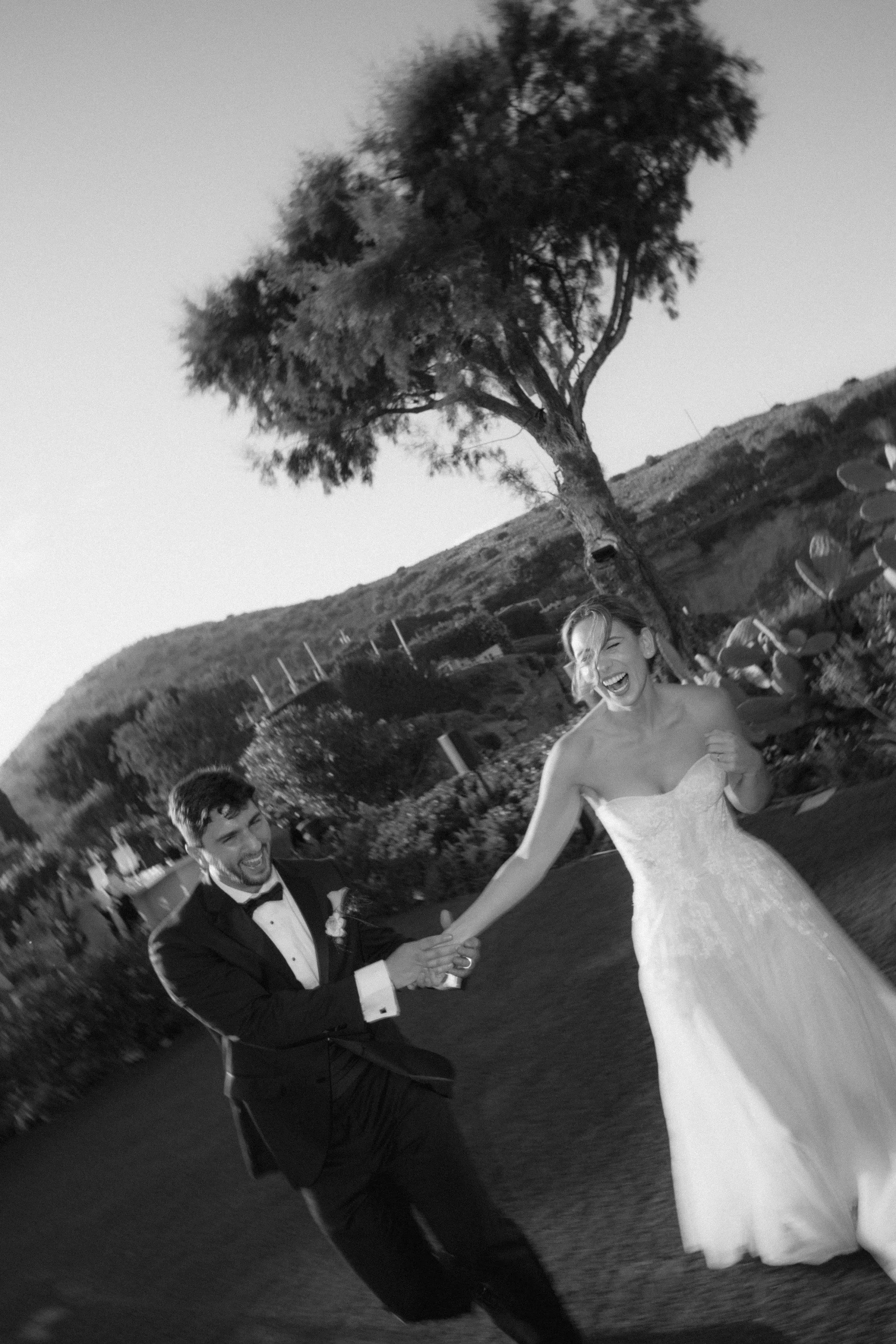 couple laughing and running