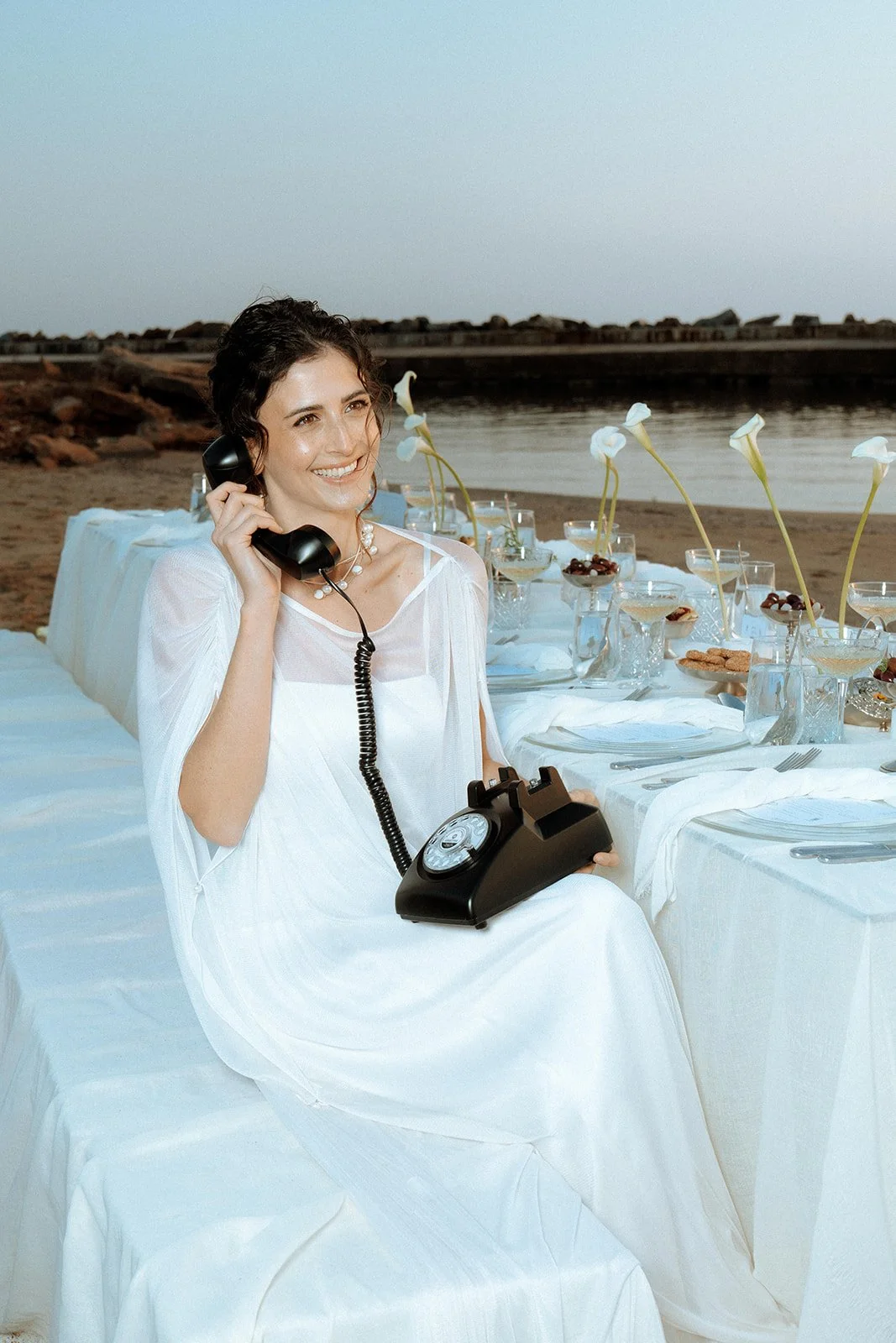 bride leaving a message on a phone 