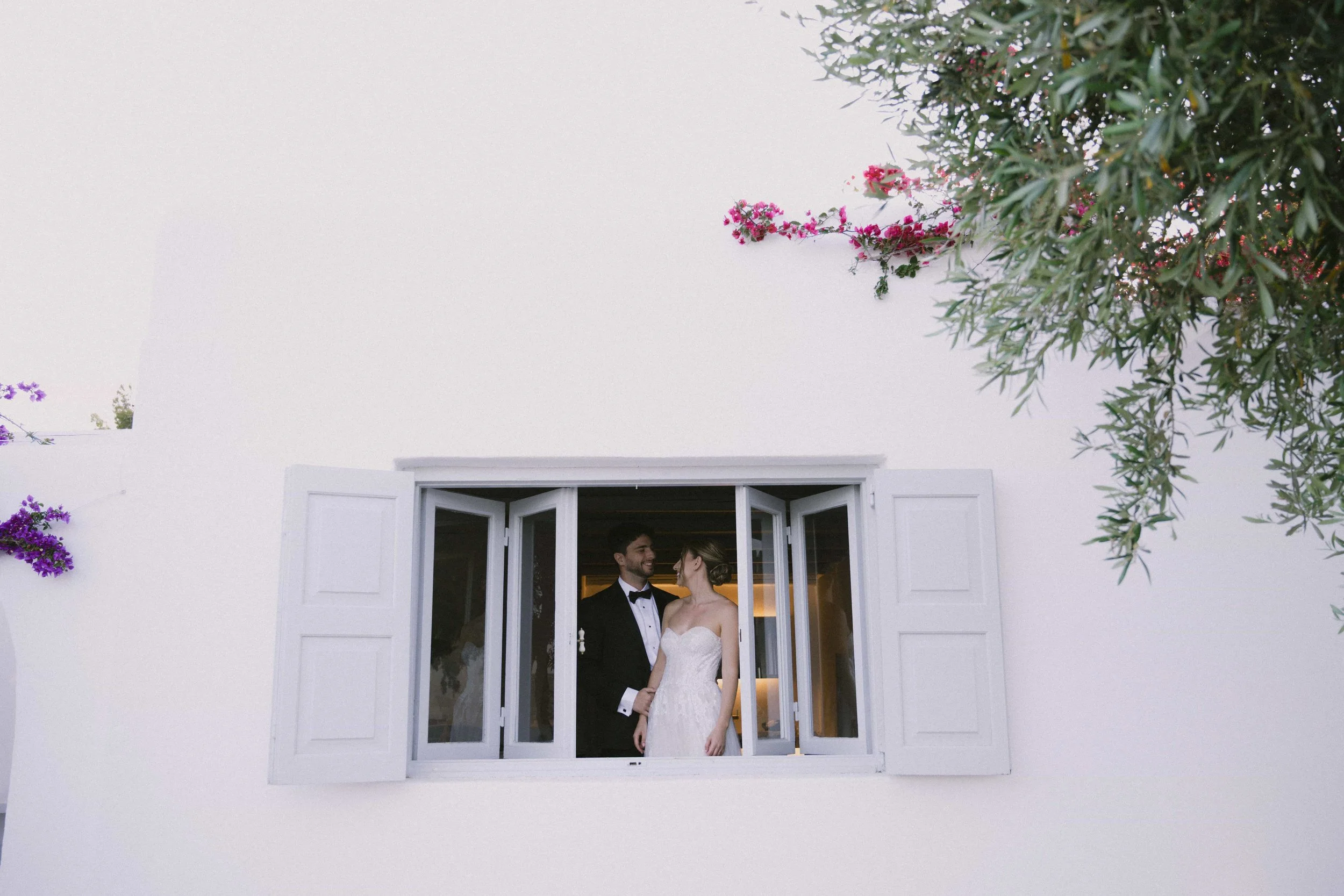couple picture from a white window