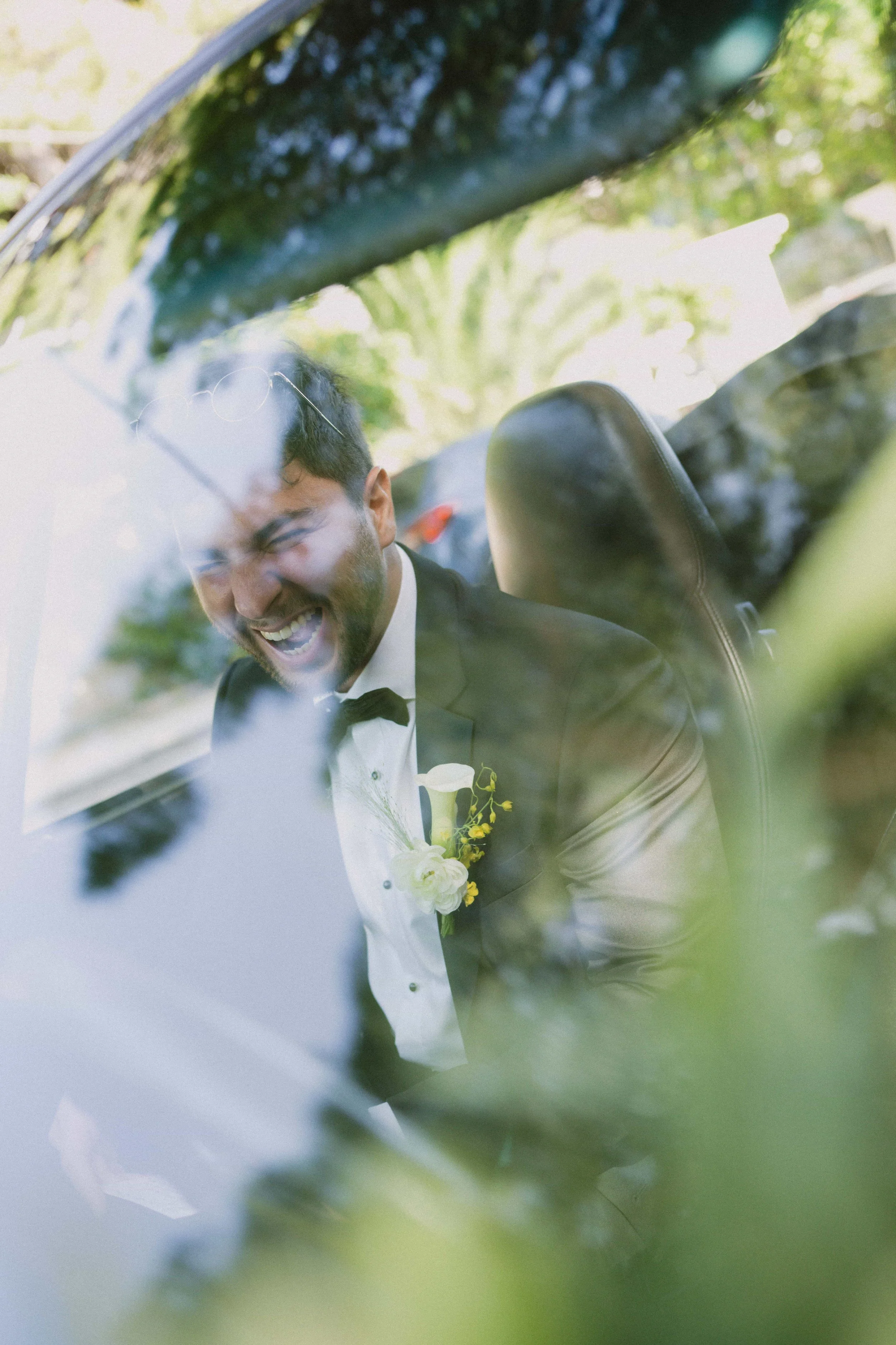 happy groom in a porsche