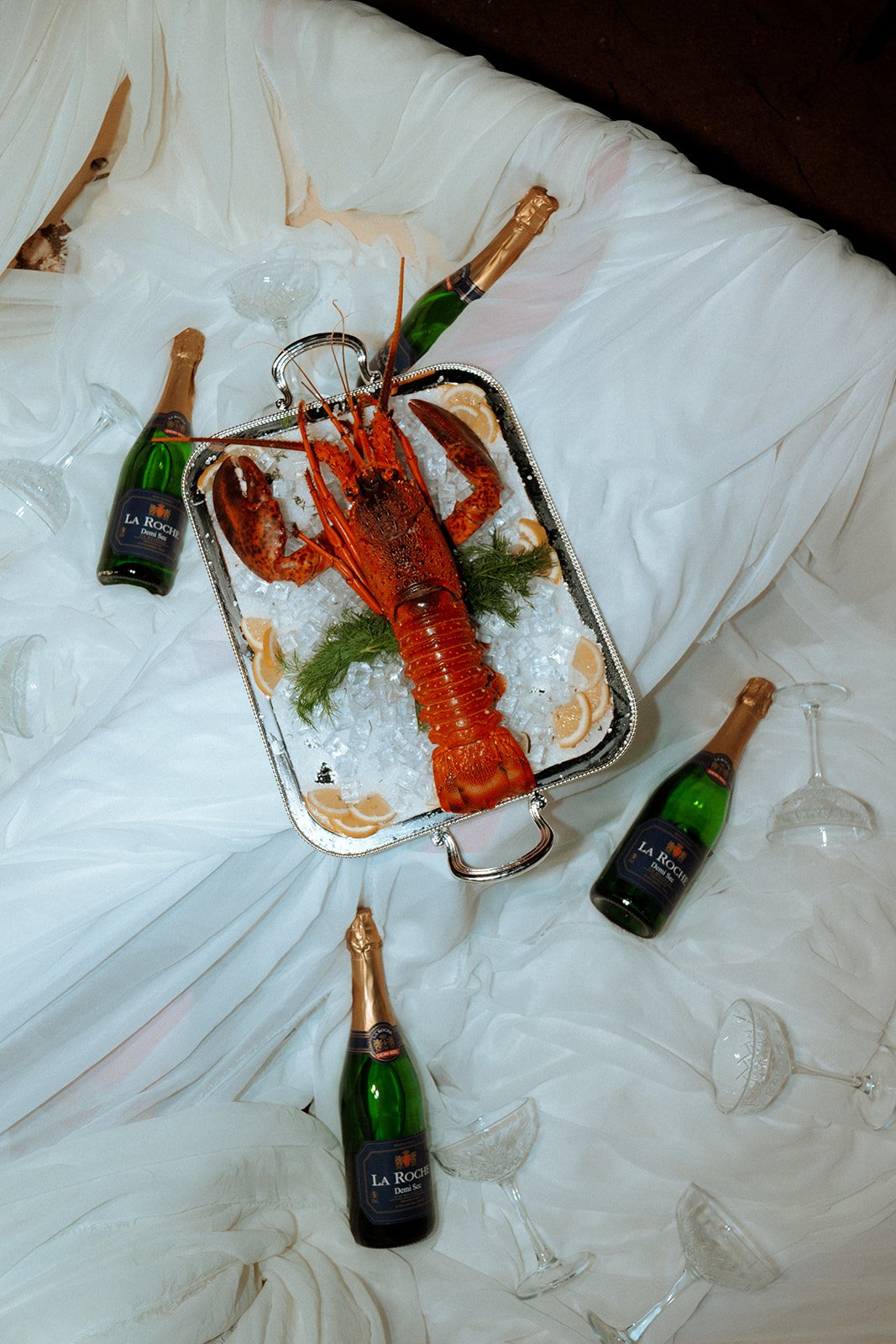 lobster in silver tray wedding shoot and champagne 