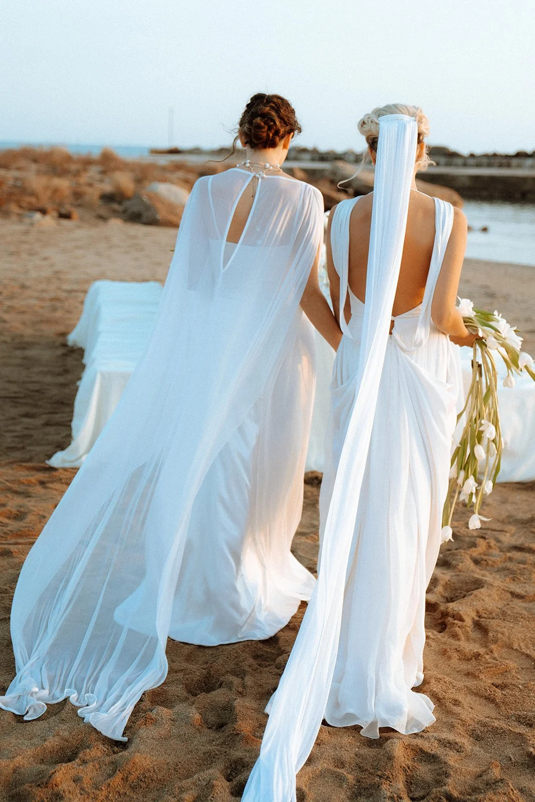 bridal cape flowing and bridal veil too