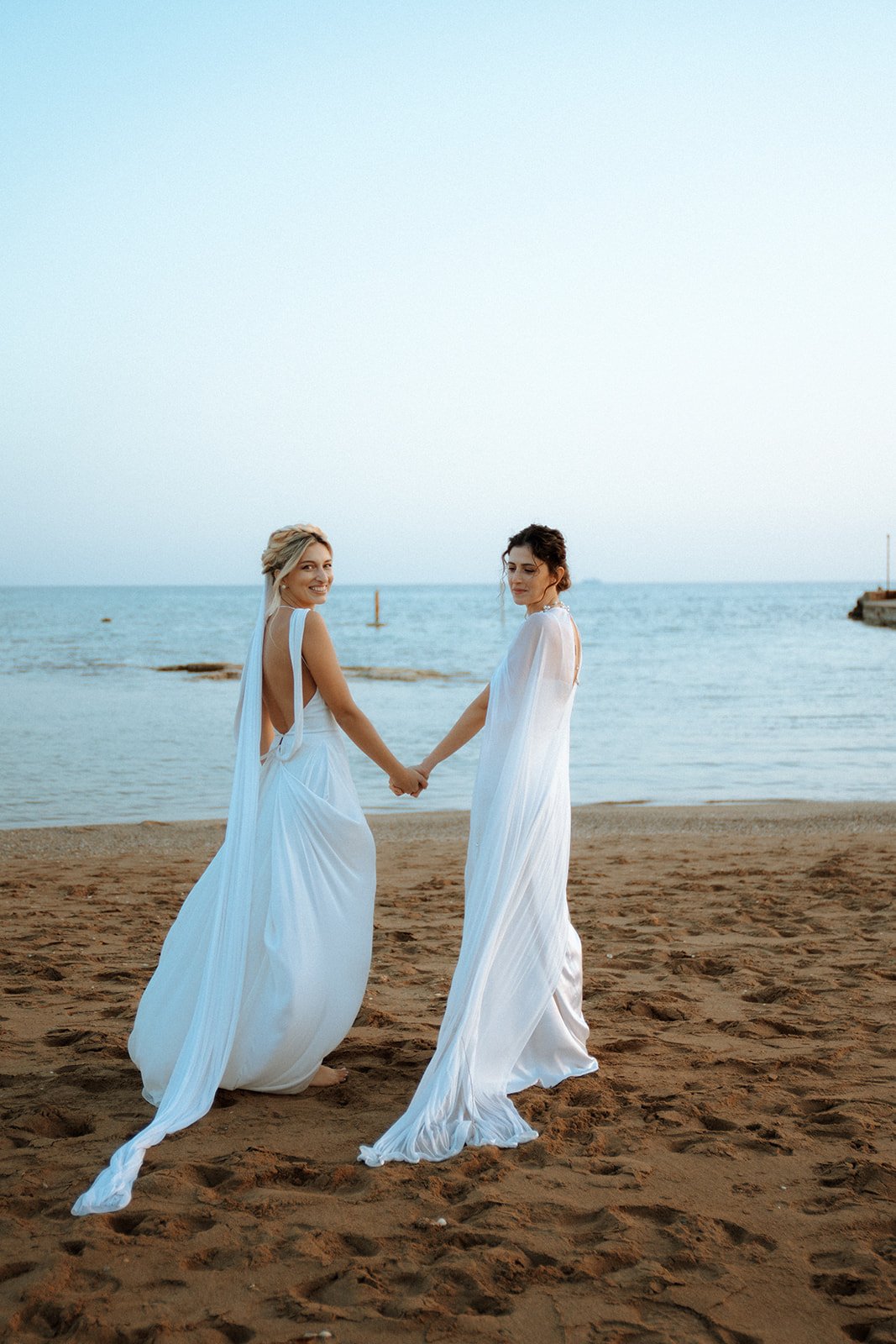 same sex couple photoshoot on the beach 
