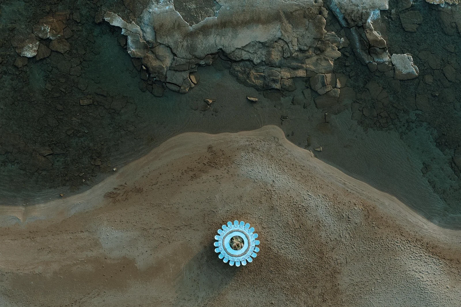 sea drone shot of a donut table
