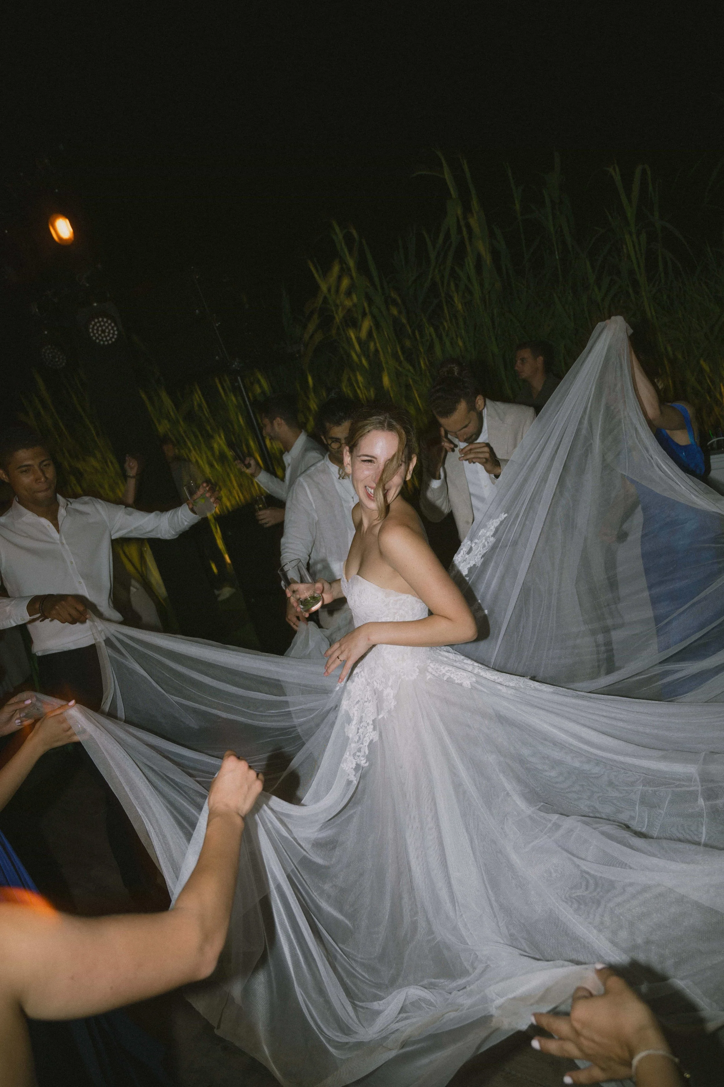 bride dress dancing with guests 